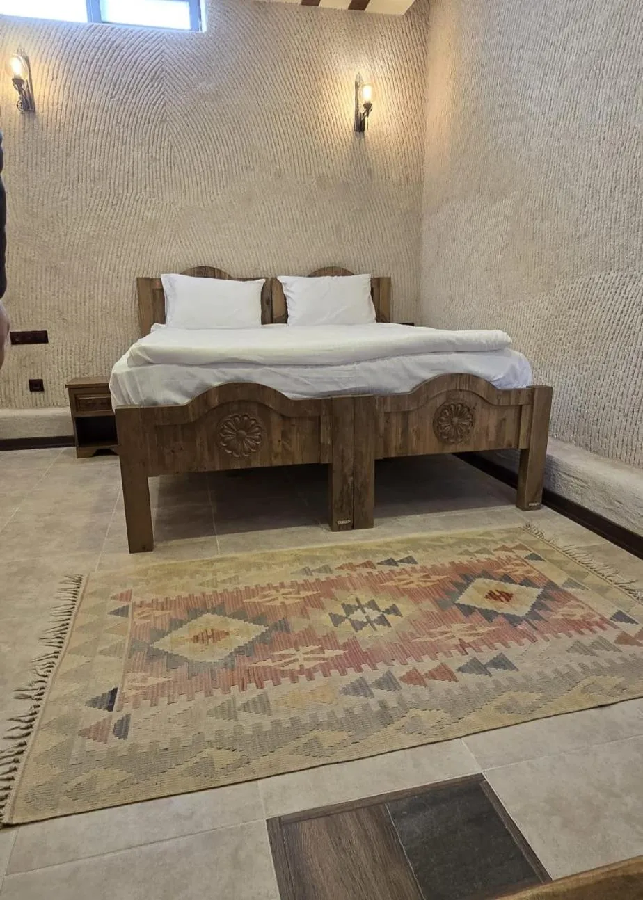 Bed in İncebey Konak Cappadocia