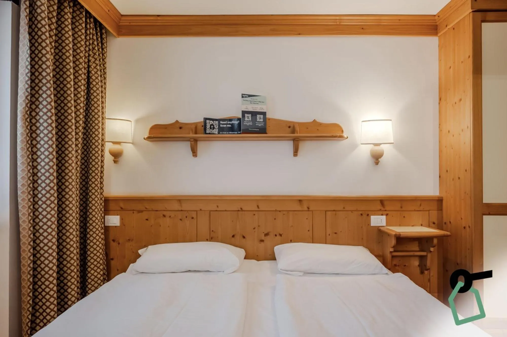 Bed in HOTIDAY Apartment Collection - San Martino