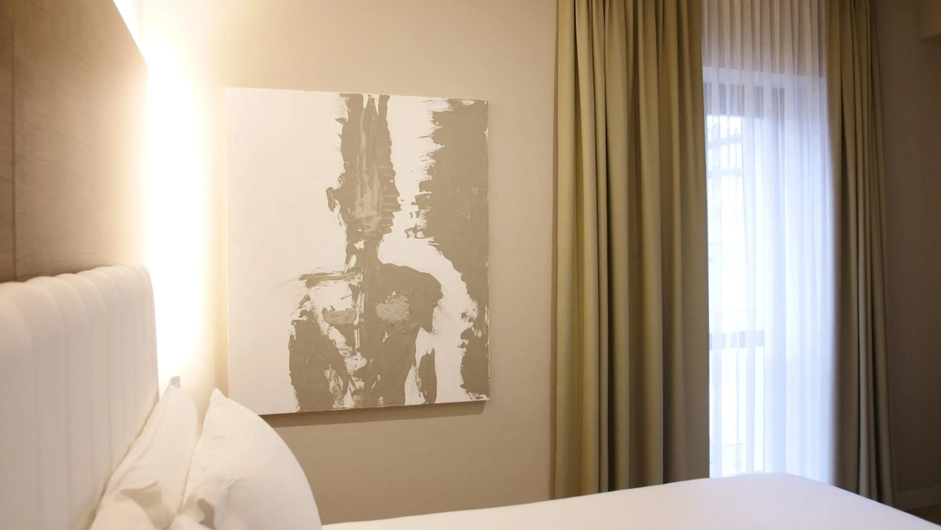 Decorative detail, Bed in Hotel Battisti 31