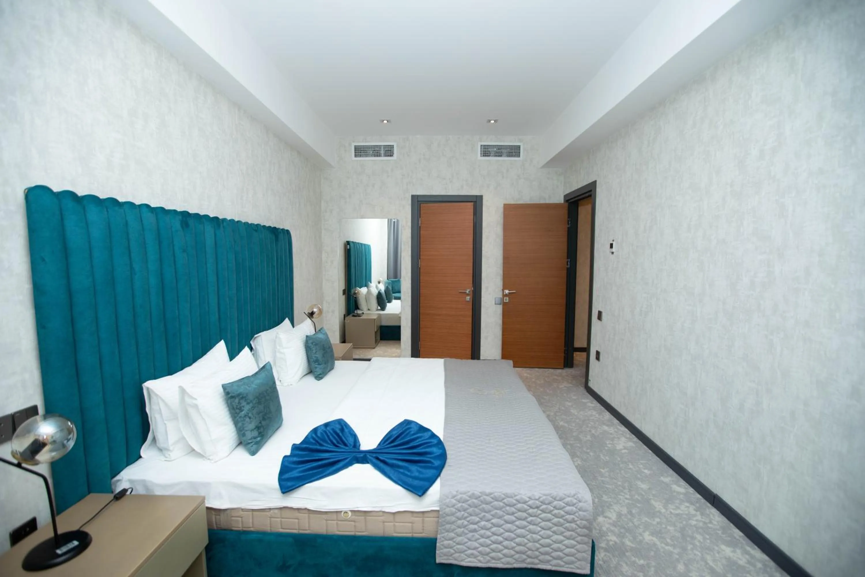 Bed in Arena Grand Hotel