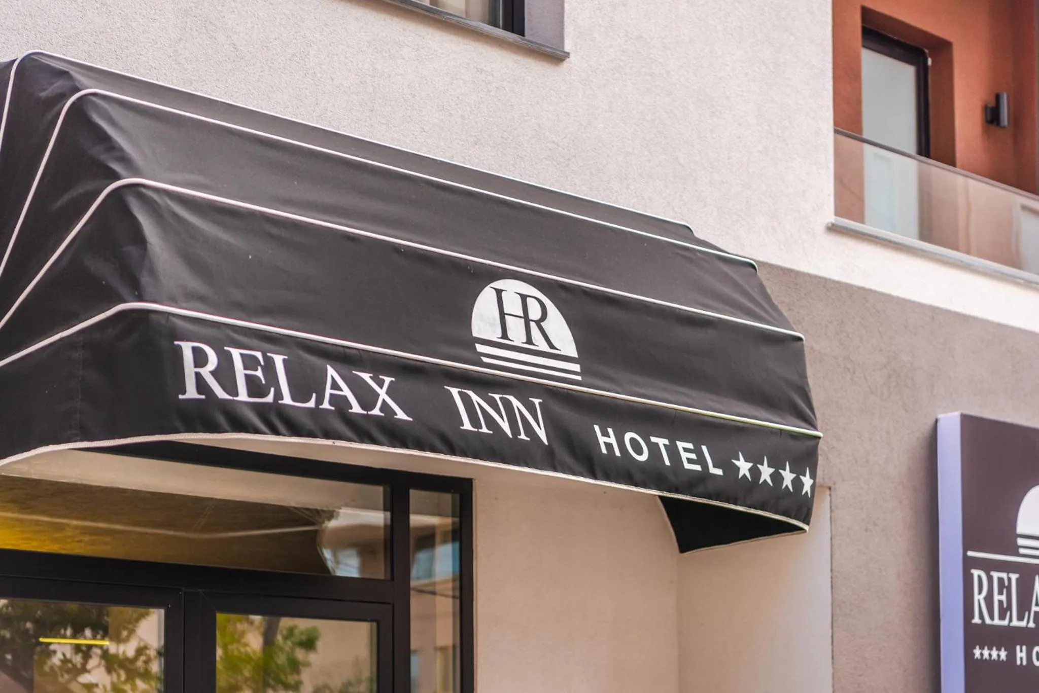 Property logo or sign in Relax Inn Hotel Durres