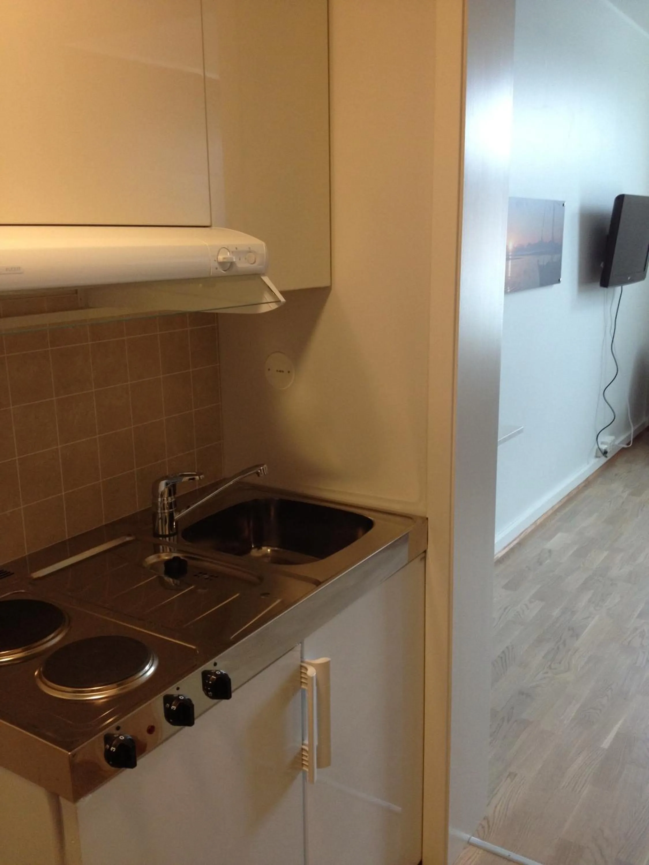 Kitchen or kitchenette in Sentrumsgården Motell AS