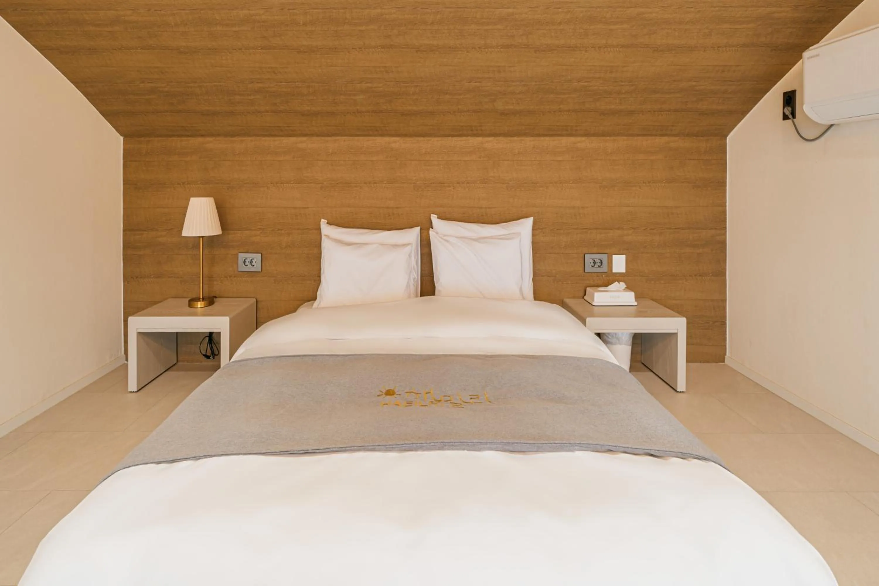 Bed in Haeilri Pool&SPA Hotel