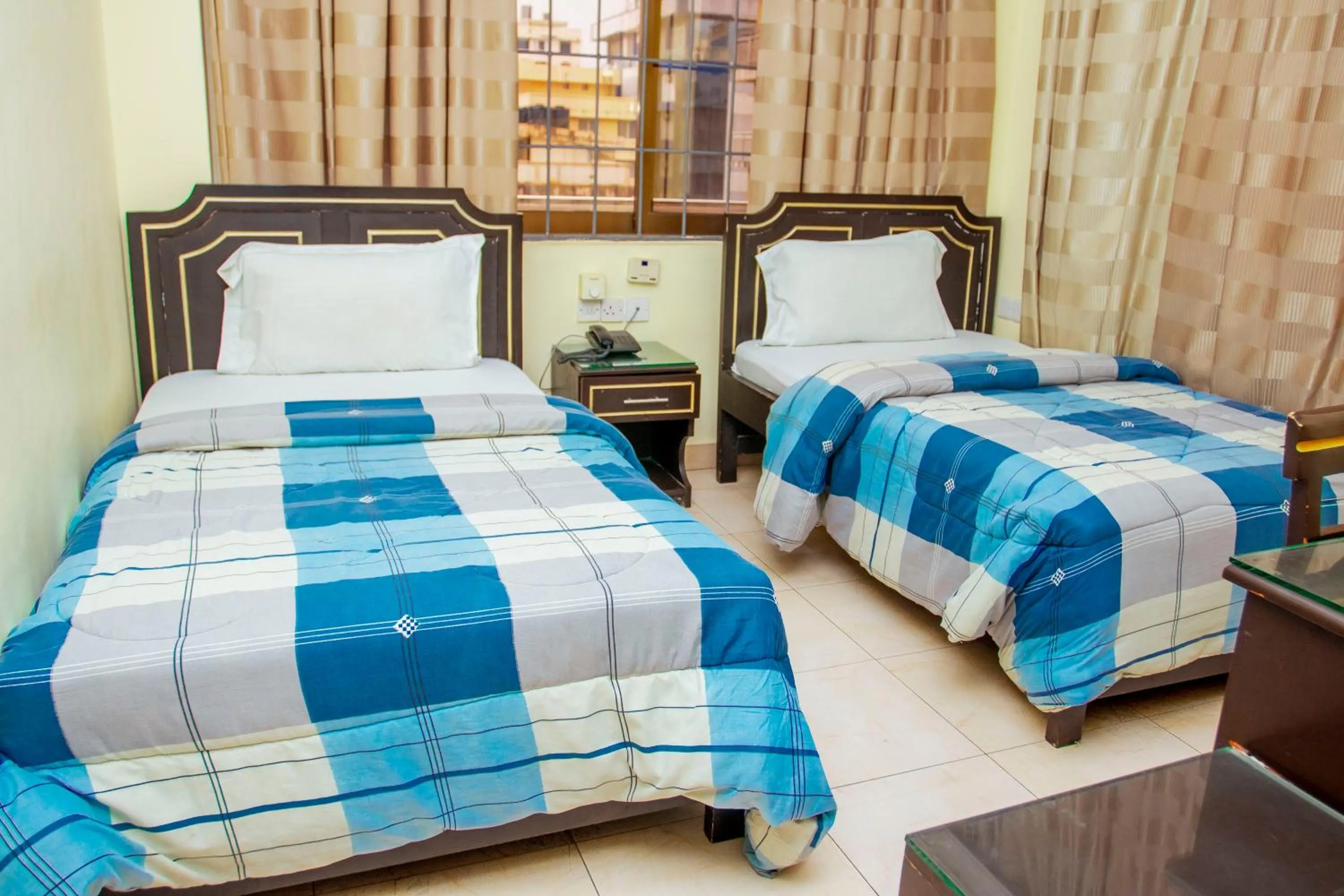 Bed in Sleep Inn Hotel - Kariakoo