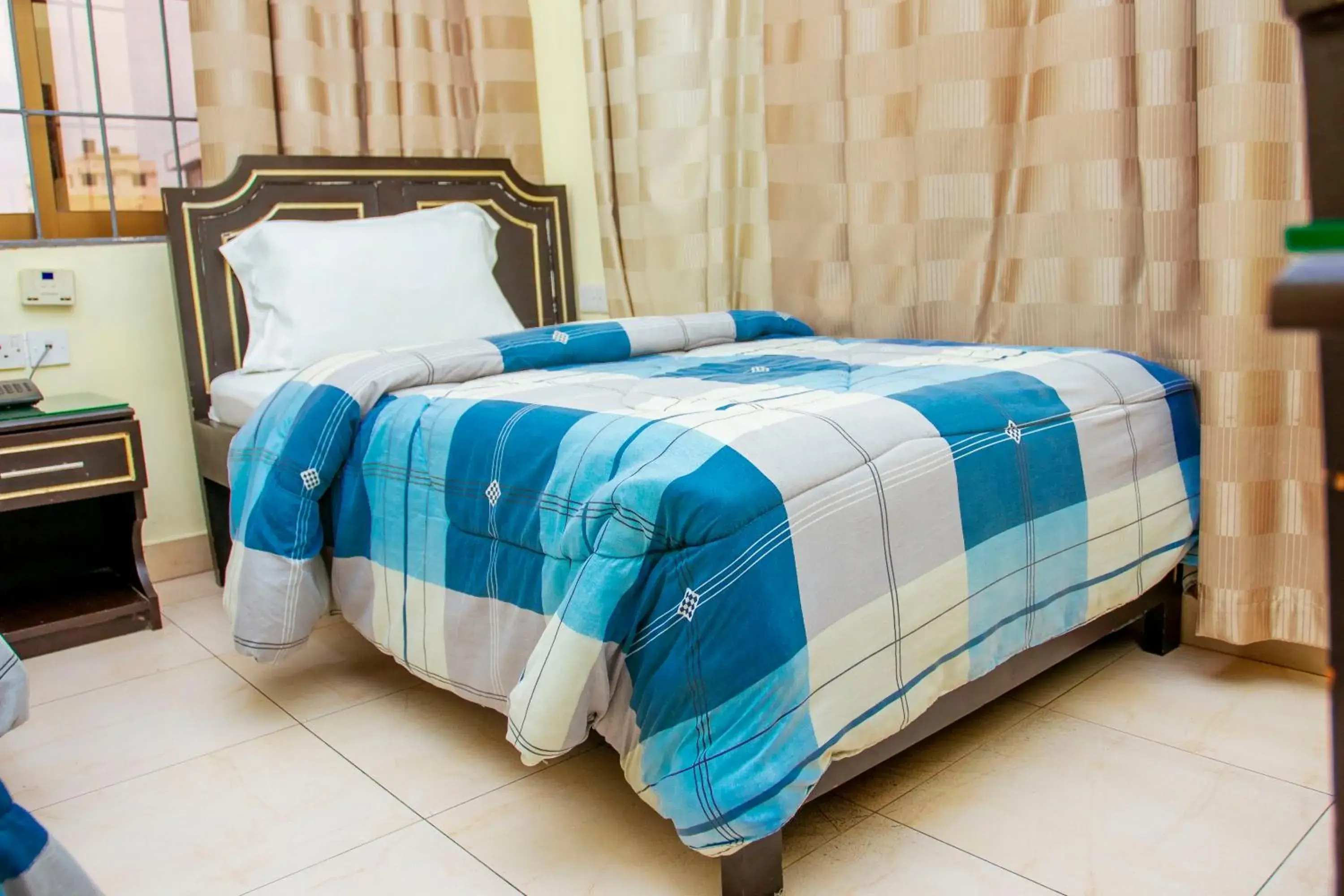 Standard Twin Room in Sleep Inn Hotel - Kariakoo Standard Twin Room in Sleep Inn Hotel - Kariakoo