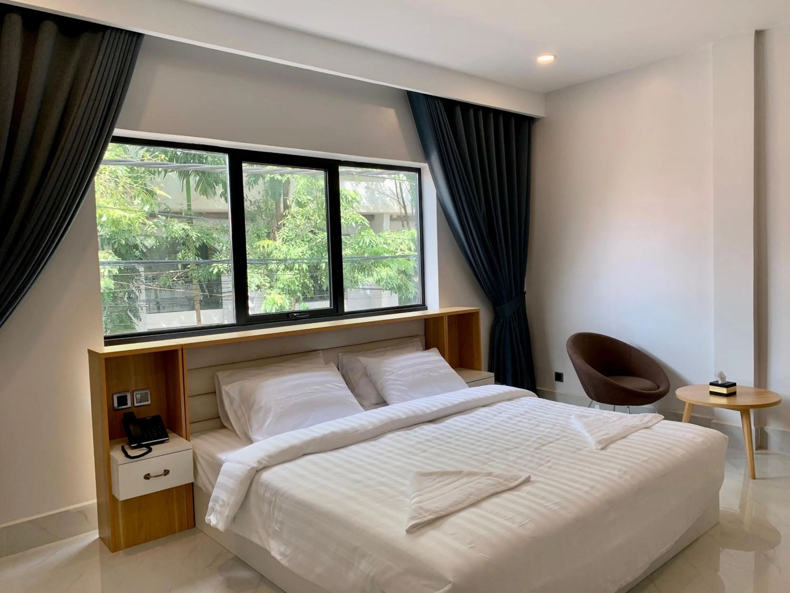 Bedroom, Bed in Nico’s Hotel and SkyBar