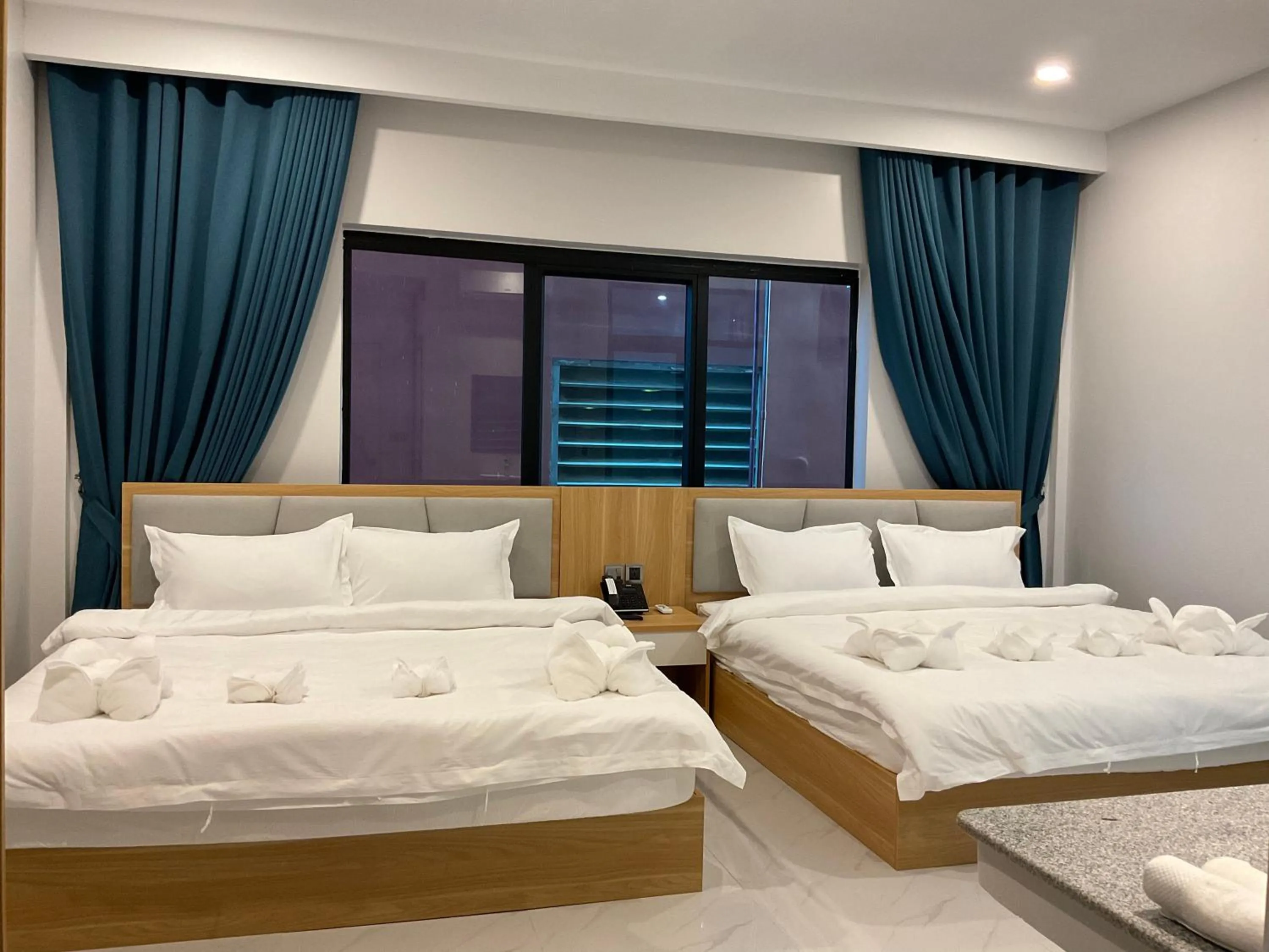 Bedroom, Bed in Nico’s Hotel and SkyBar