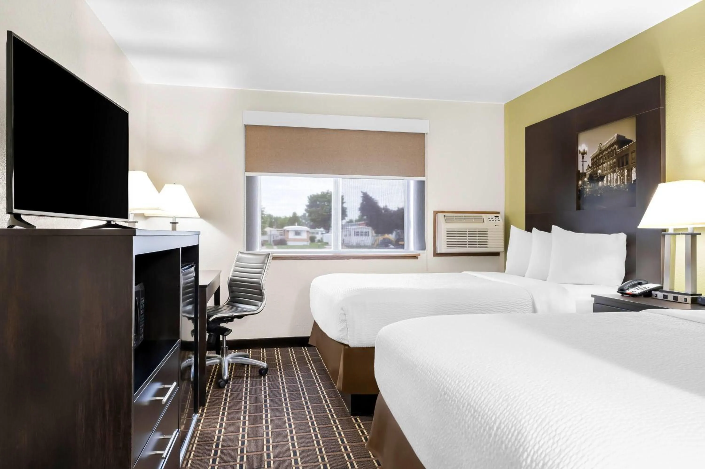 Bed in Super 8 by Wyndham La Crosse