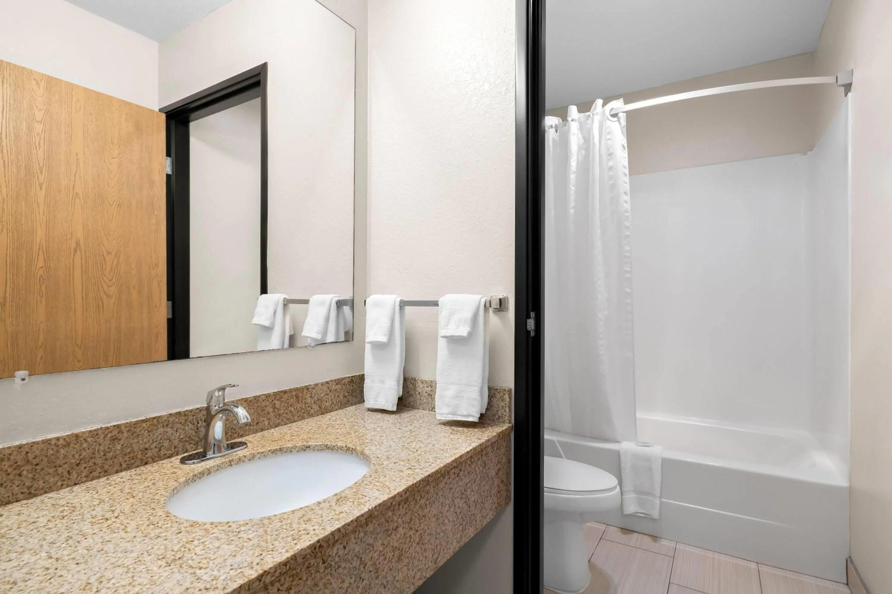 Bathroom in Super 8 by Wyndham La Crosse