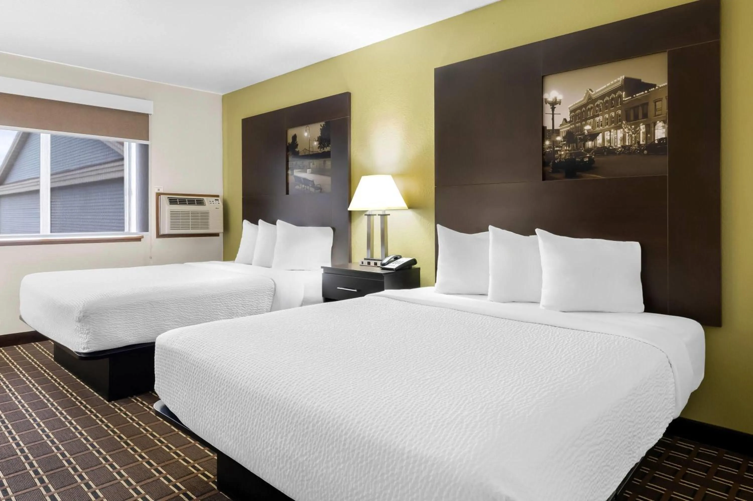 Bed in Super 8 by Wyndham La Crosse