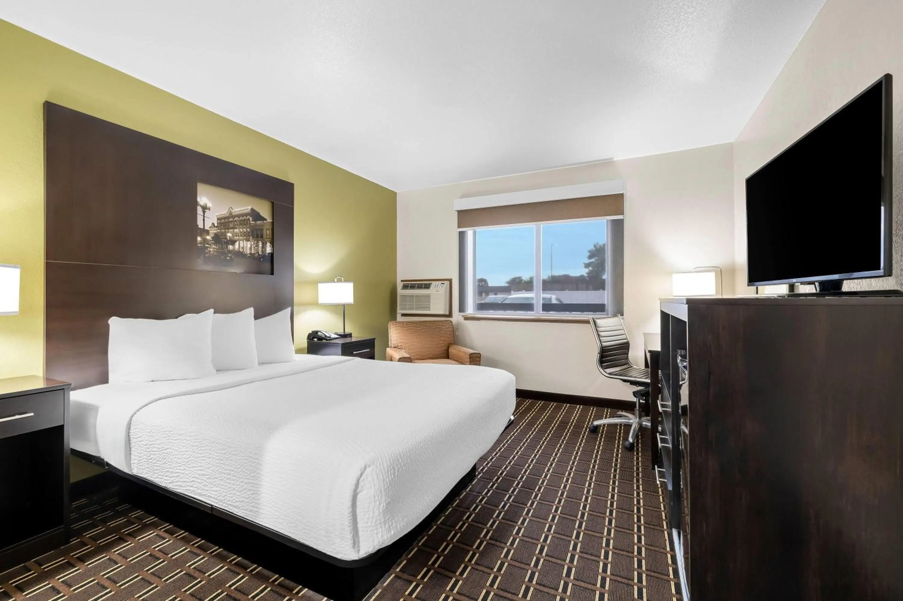 Bed in Super 8 by Wyndham La Crosse