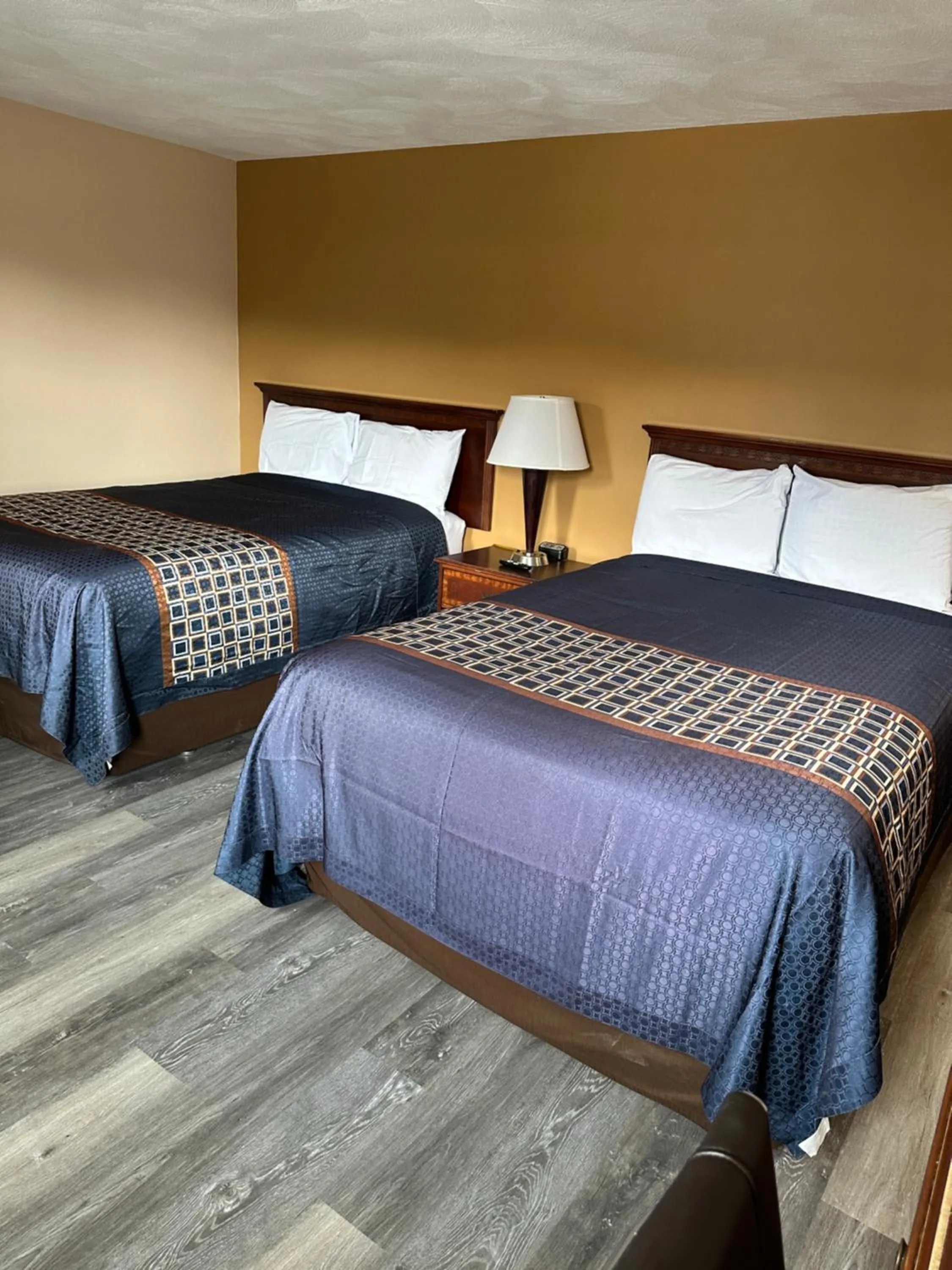 Bed in Wickford Motor Inn