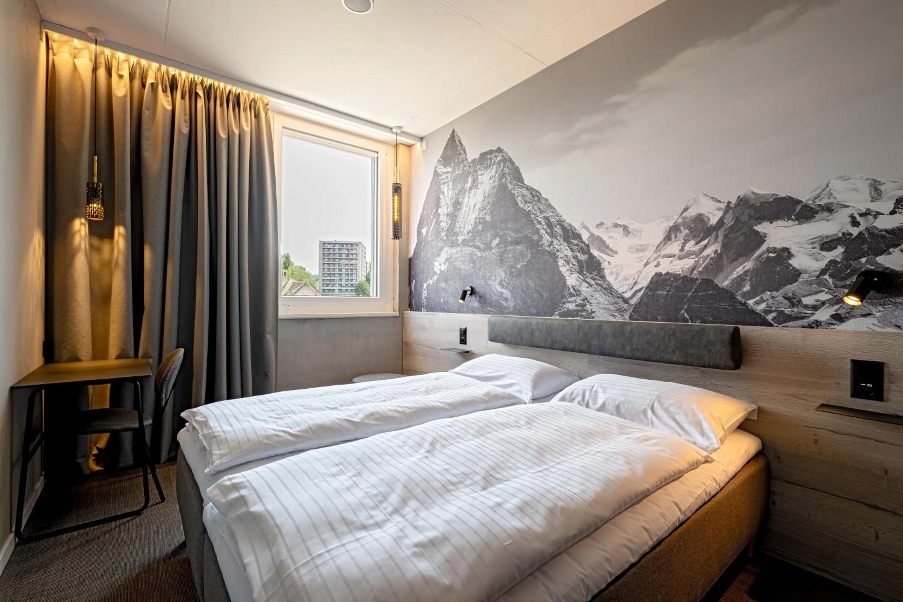 Bed in Zleep Hotel Lausanne-Chavannes