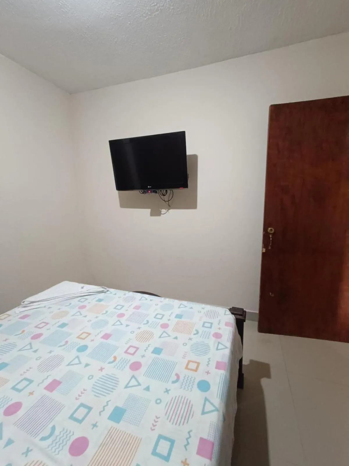 Bed in Hotel Granada Inn