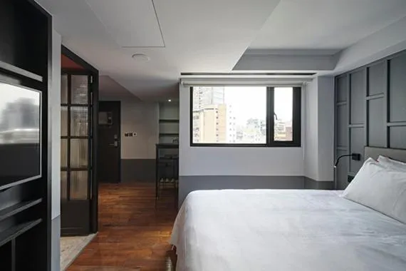 Bed in Red Dot Hotel