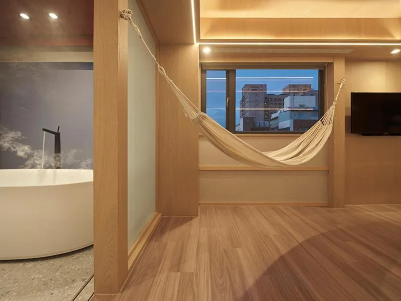 Bed in Red Dot Hotel