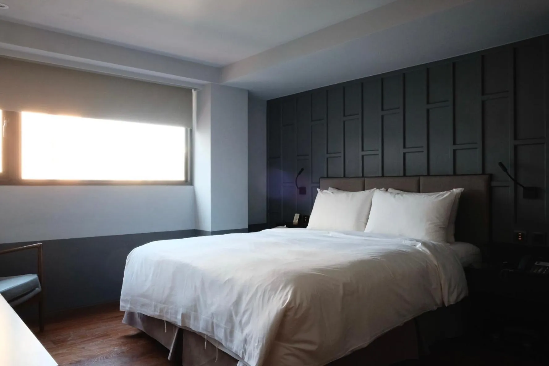 Bed in Reddot Hotel