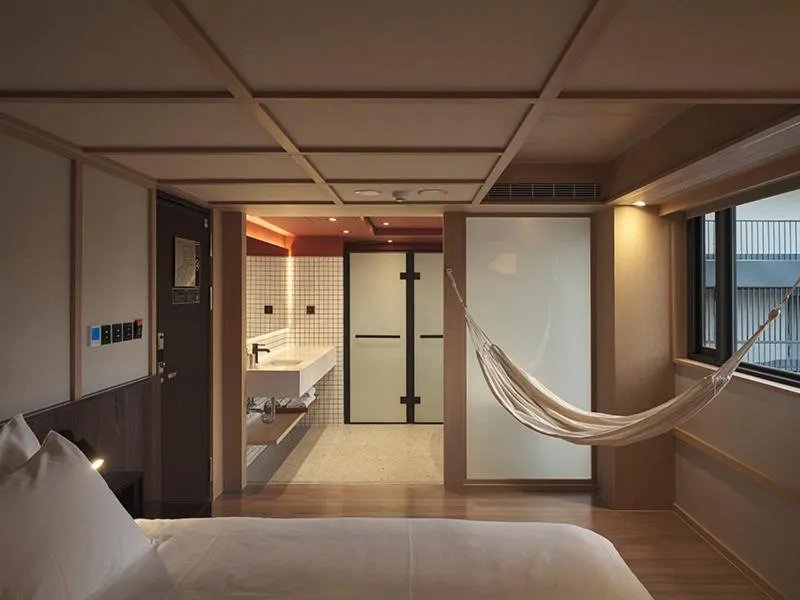 Bed in Red Dot Hotel