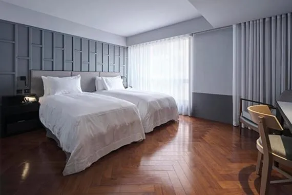 Bed in Red Dot Hotel