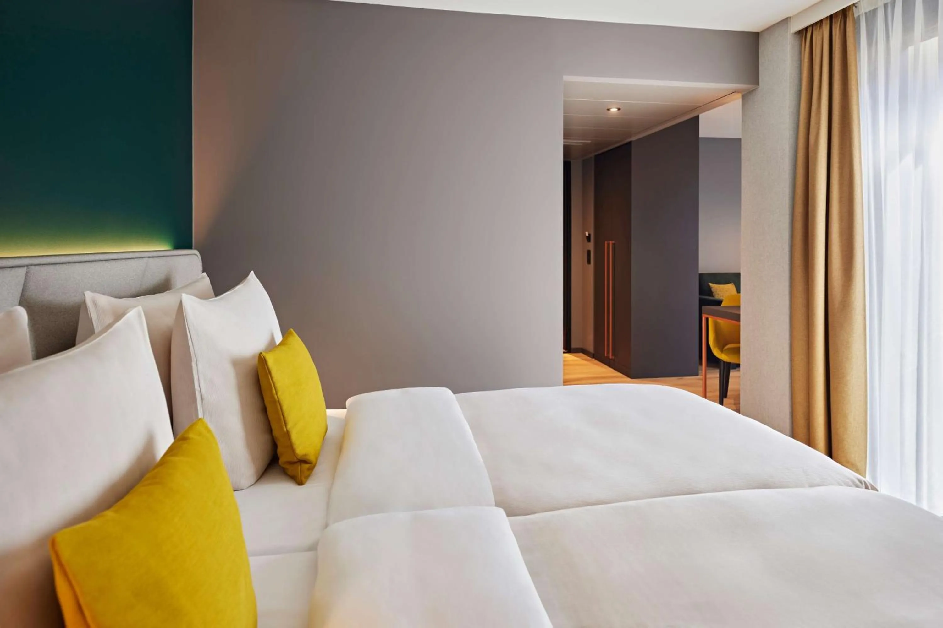 Photo of the whole room, Bed in Essential by Dorint Interlaken - New Opening