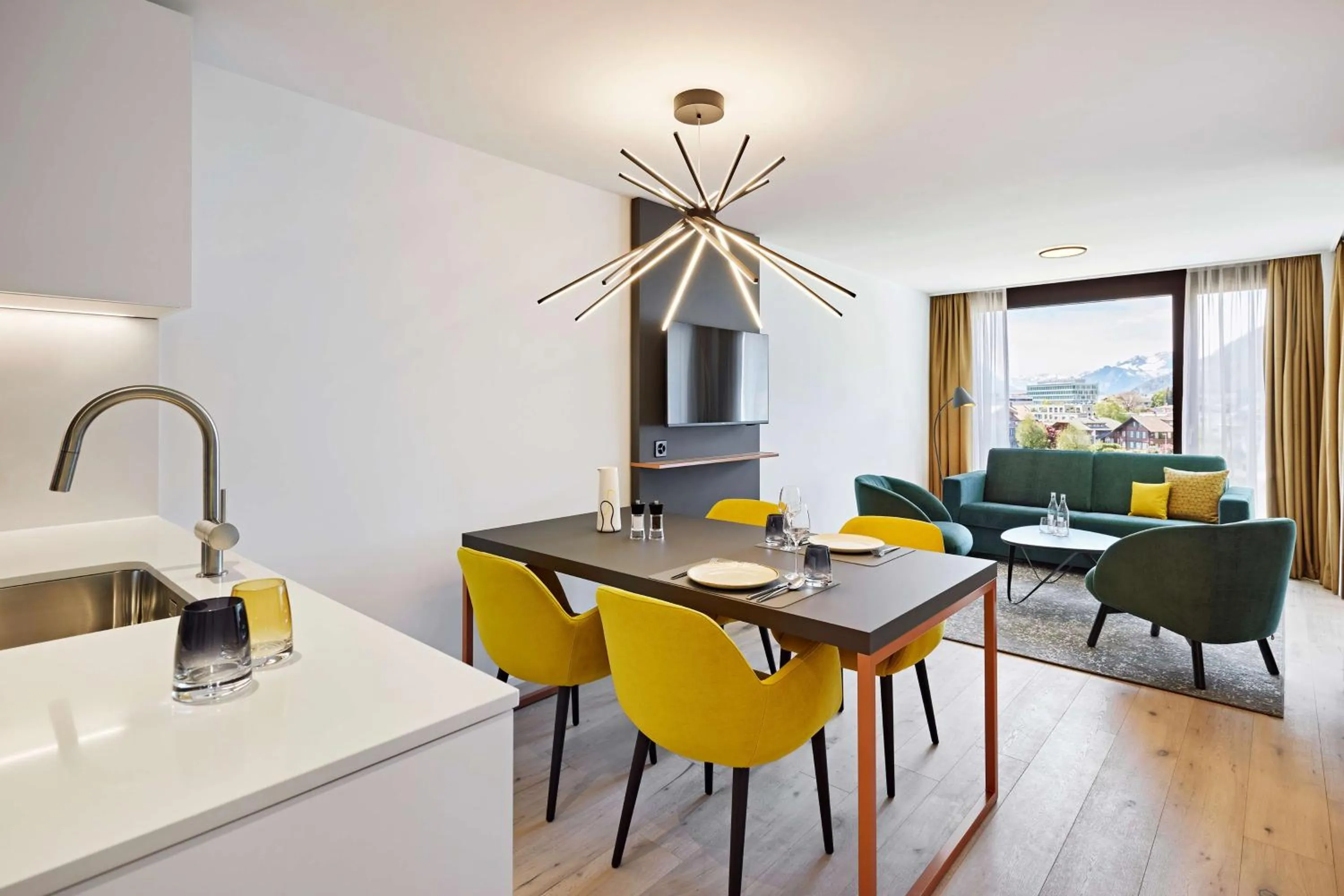 Photo of the whole room in Essential by Dorint Interlaken - New Opening