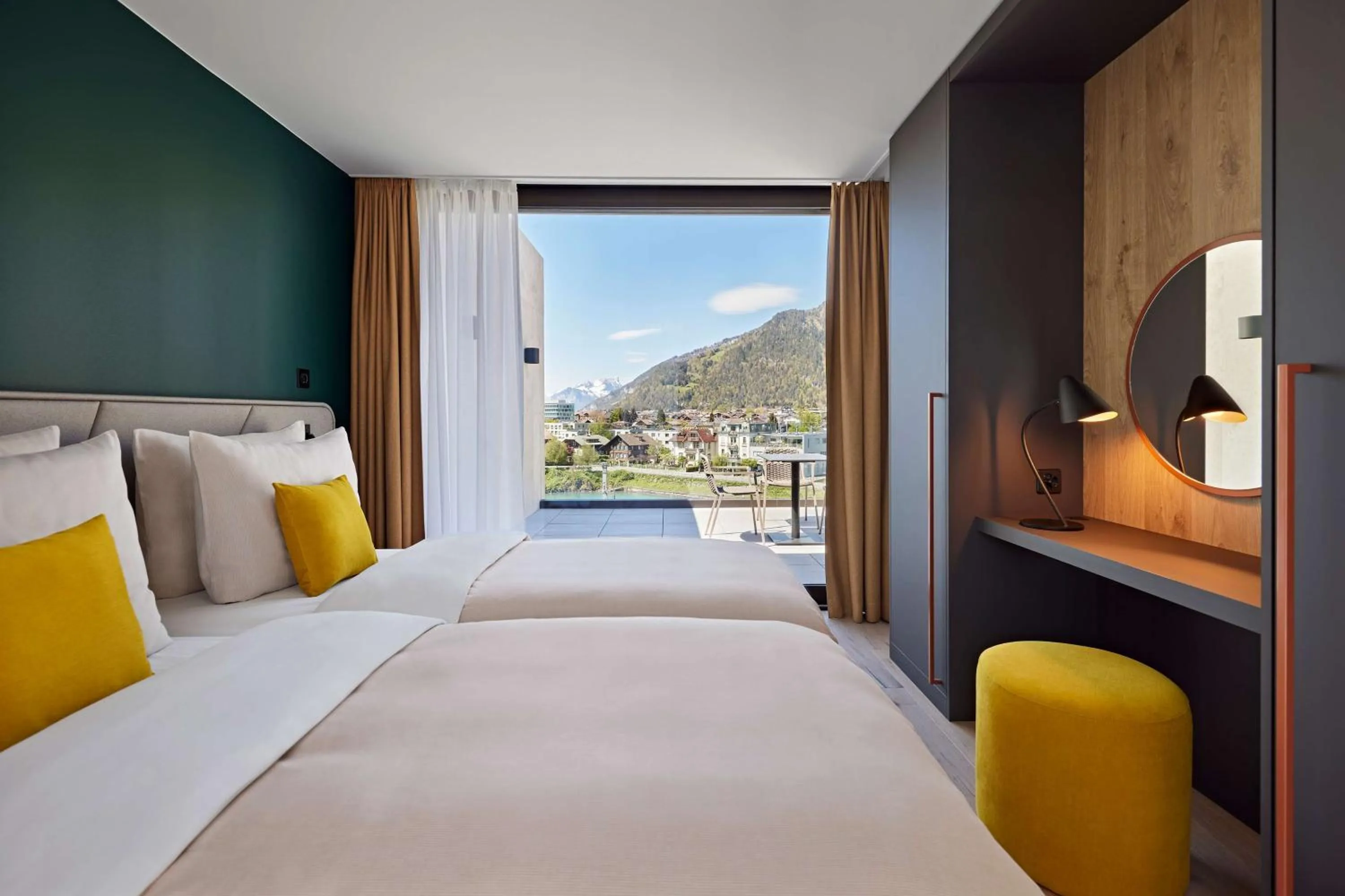 Photo of the whole room, Bed in Essential by Dorint Interlaken - New Opening