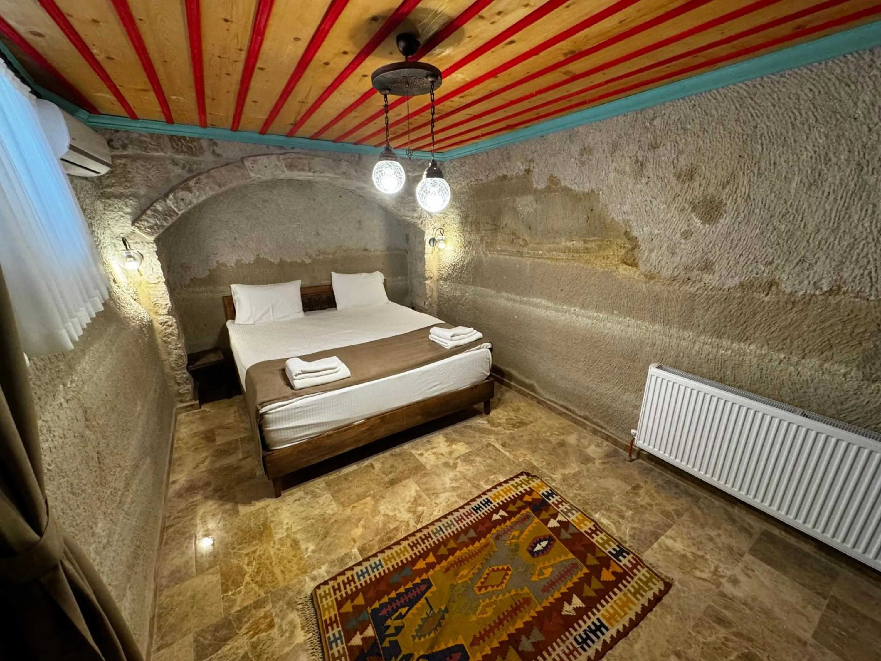 Bed in Rustic Caves