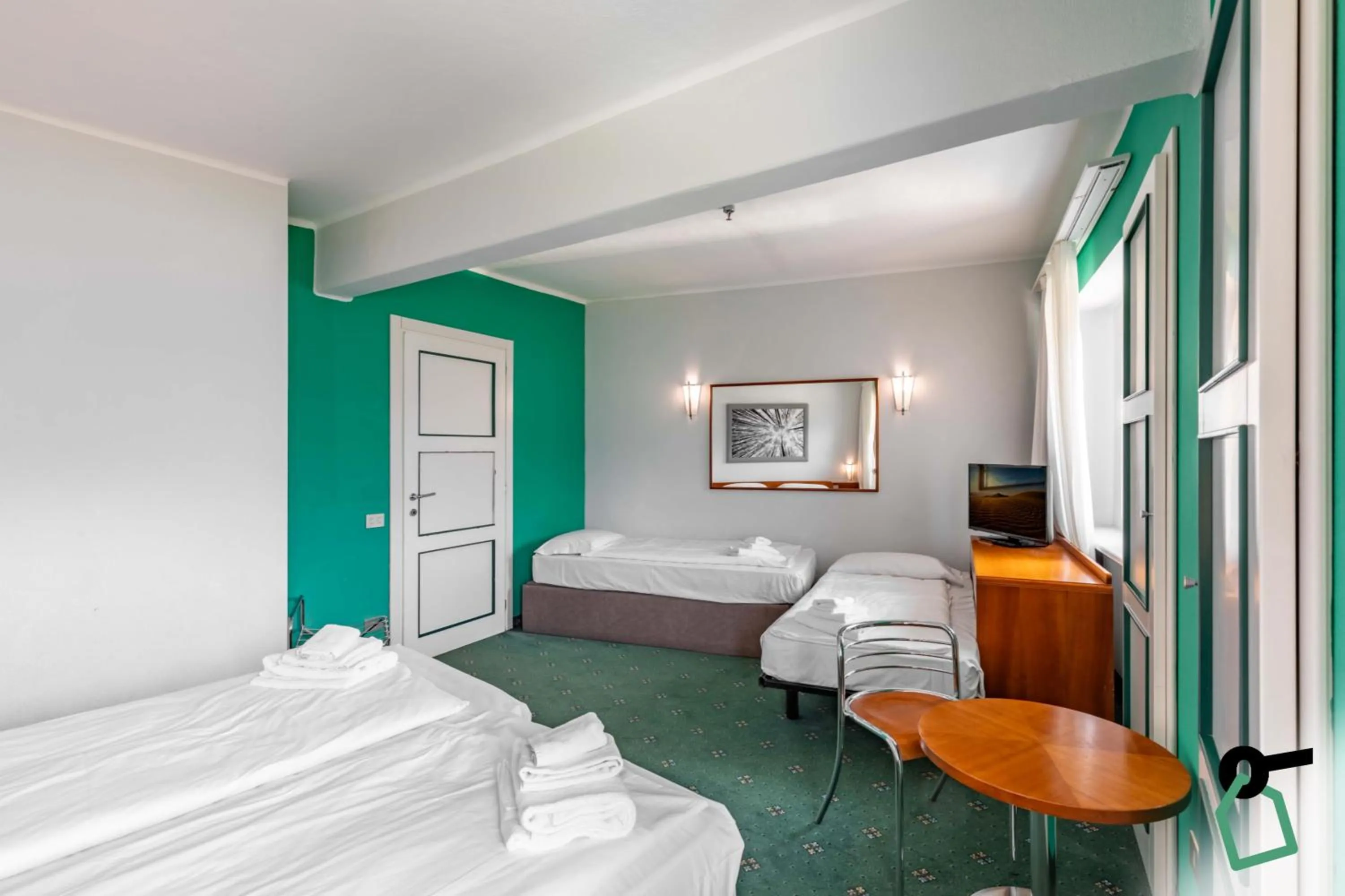 Photo of the whole room, Bed in Hotiday Sauze Torre