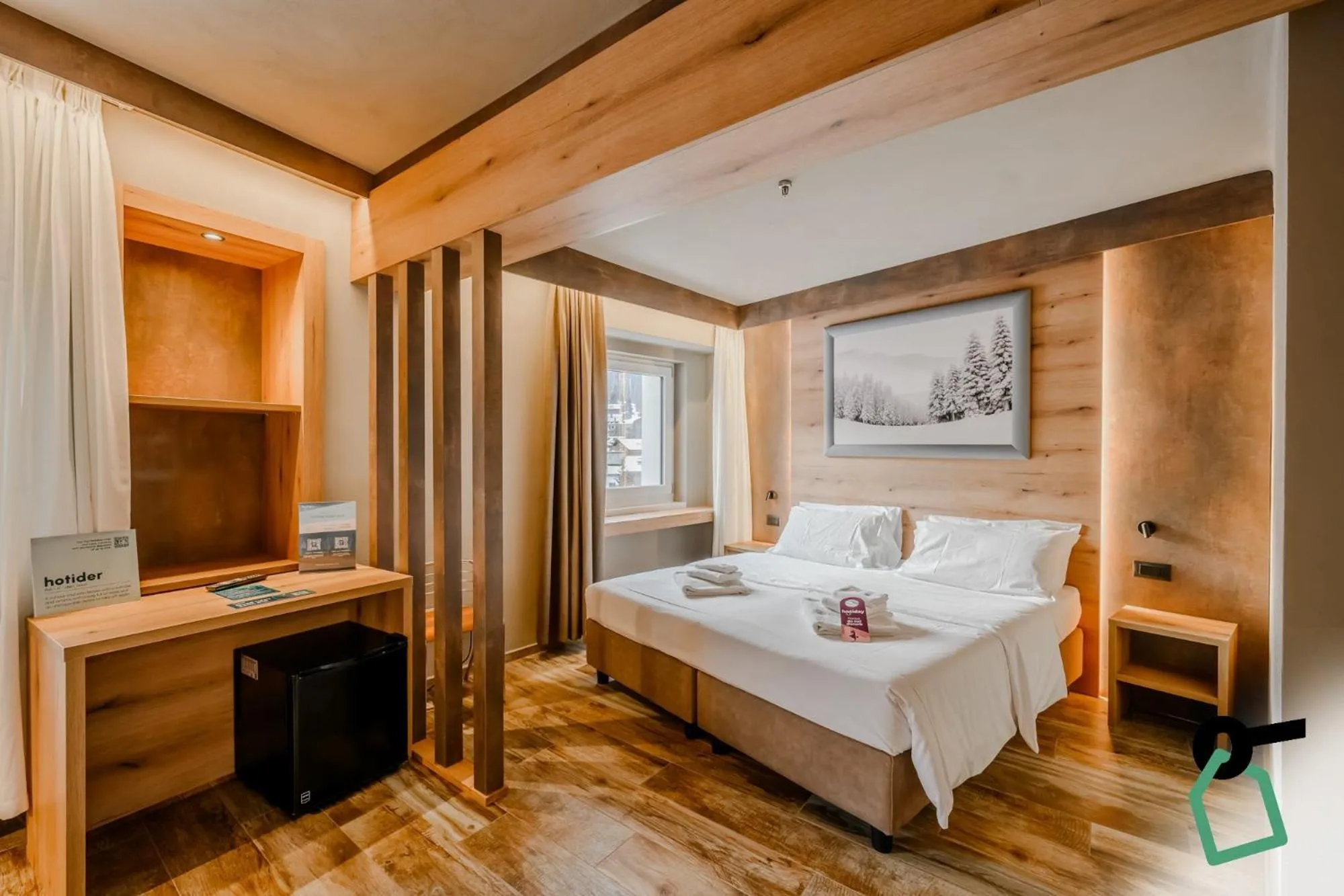 Photo of the whole room, Bed in Hotiday Sauze Torre