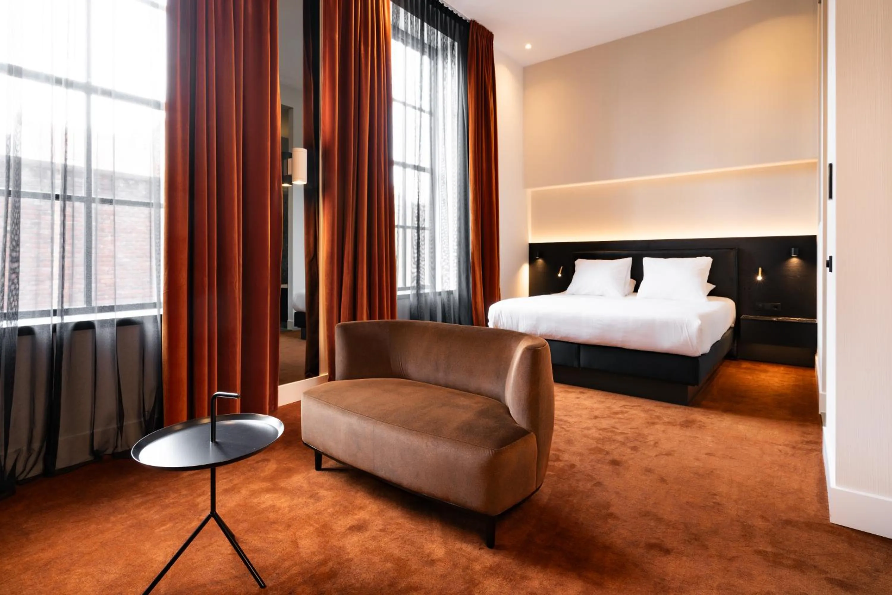 Photo of the whole room, Bed in Van der Valk TheaterHotel De Oranjerie
