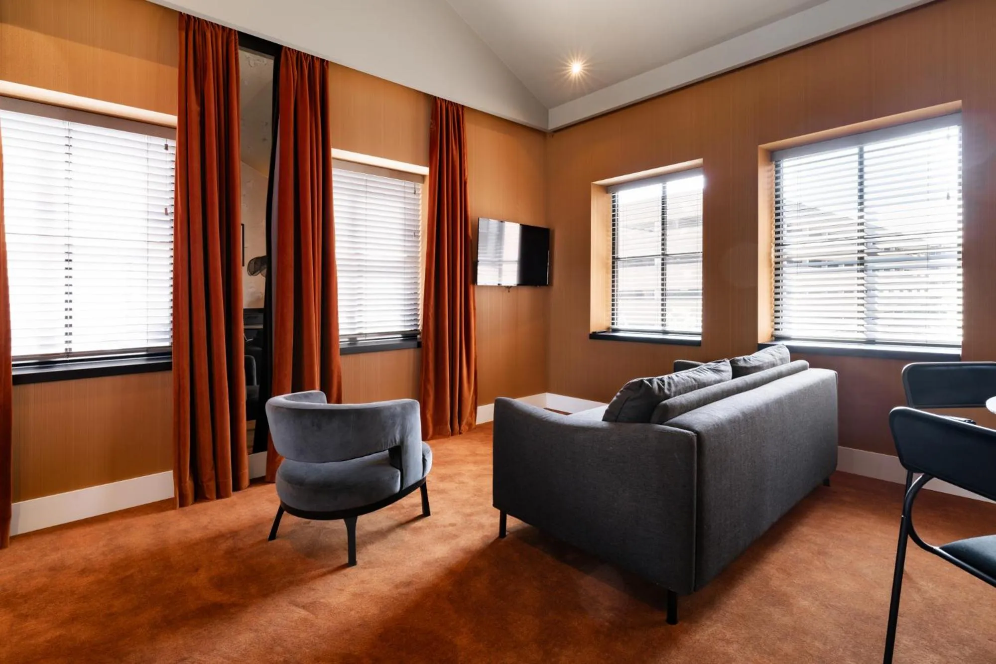 Seating area in Van der Valk TheaterHotel De Oranjerie