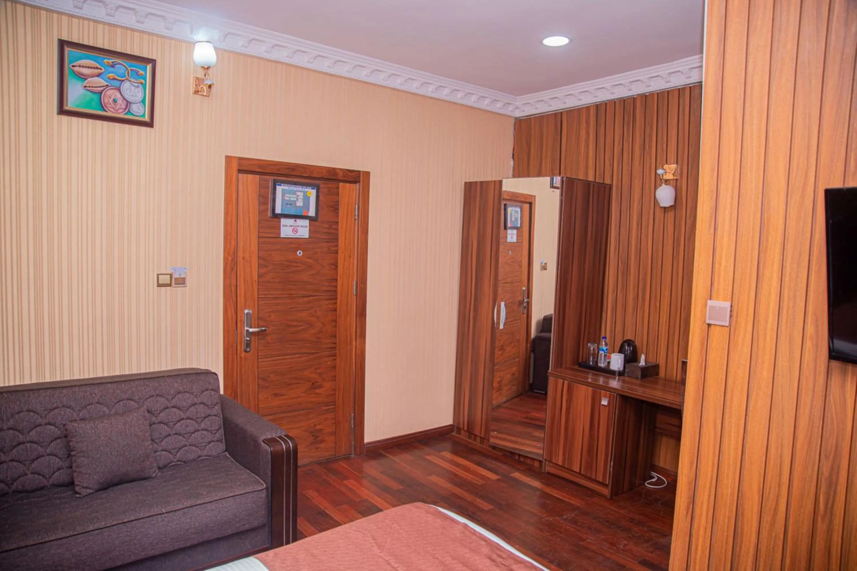 Bedroom in MAHOGANY HOTEL AND SUITES