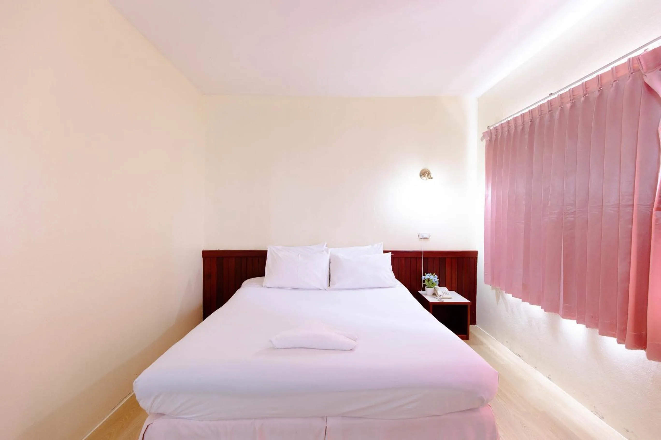 Bed in Chumphon Palace Hotel