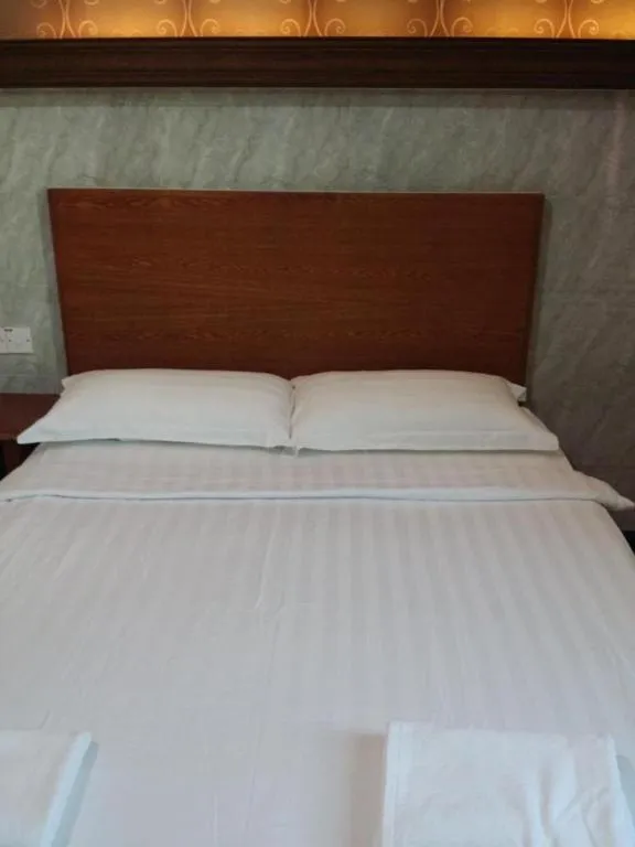 Bed in Maxi Inn