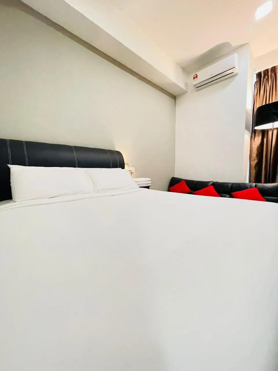 Bedroom in Hotel O Hi-homestay