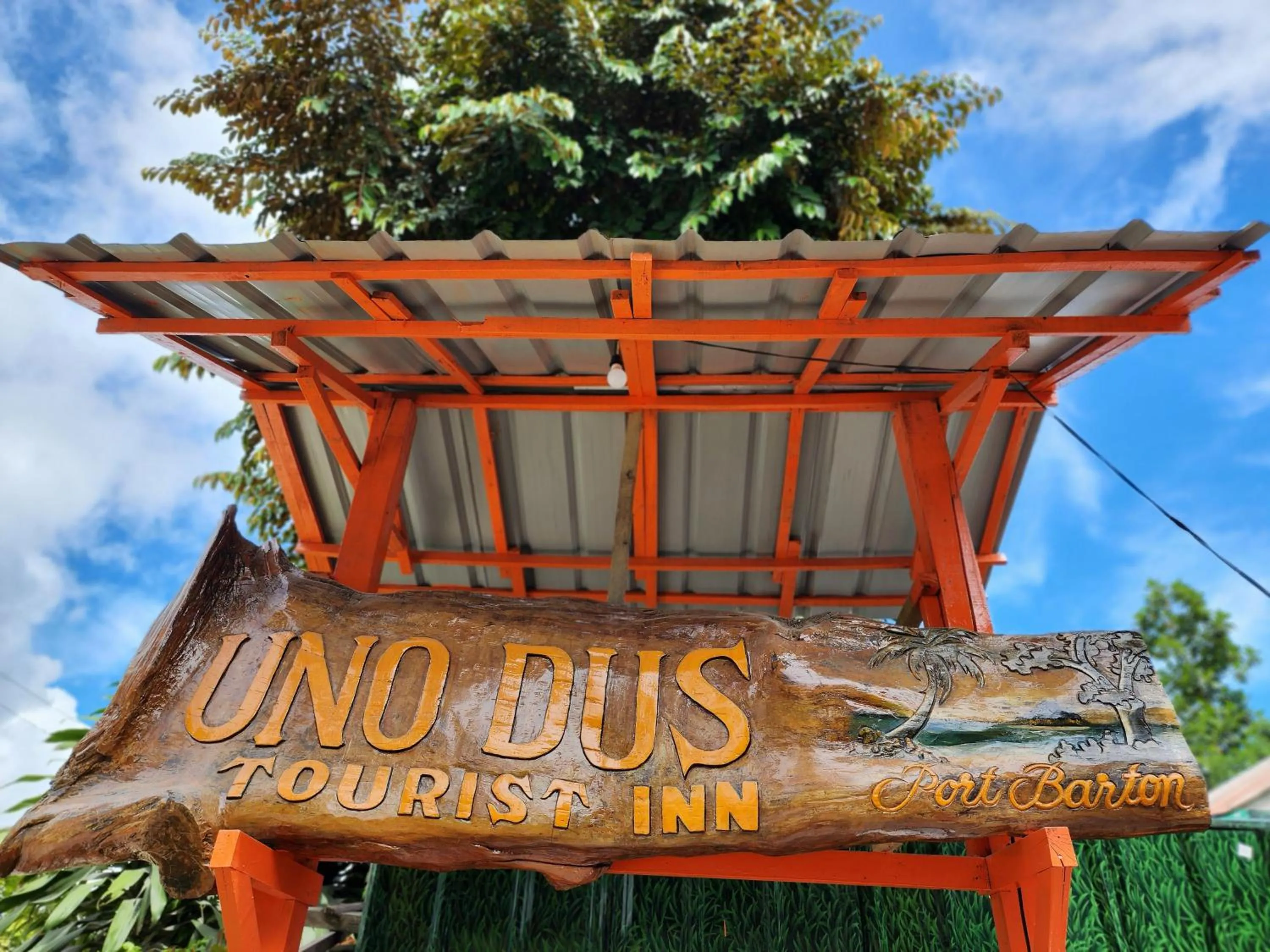 Logo/Certificate/Sign in Uno Dus Tourist Inn