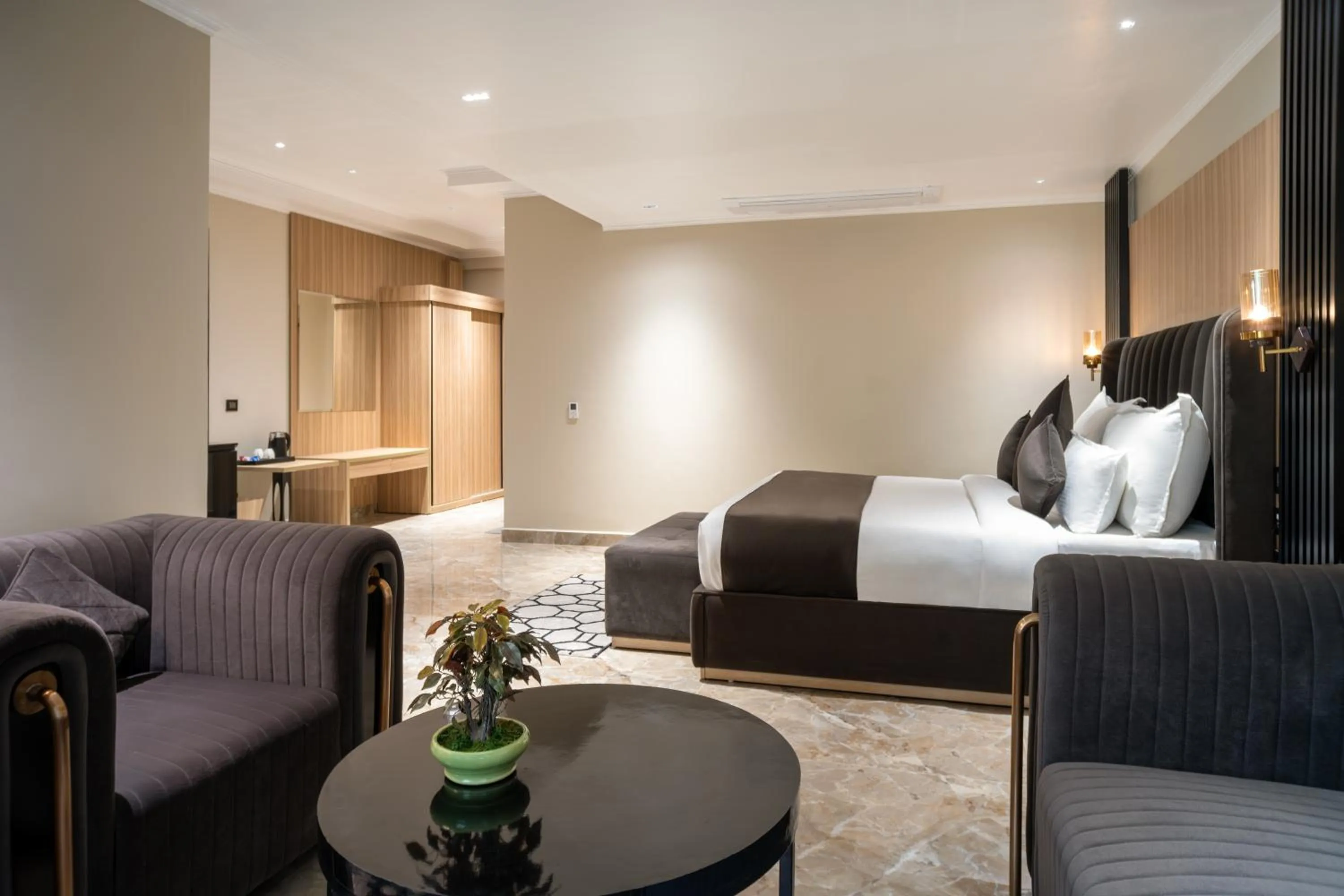 Living room, Bed in Alpine hotel and villas