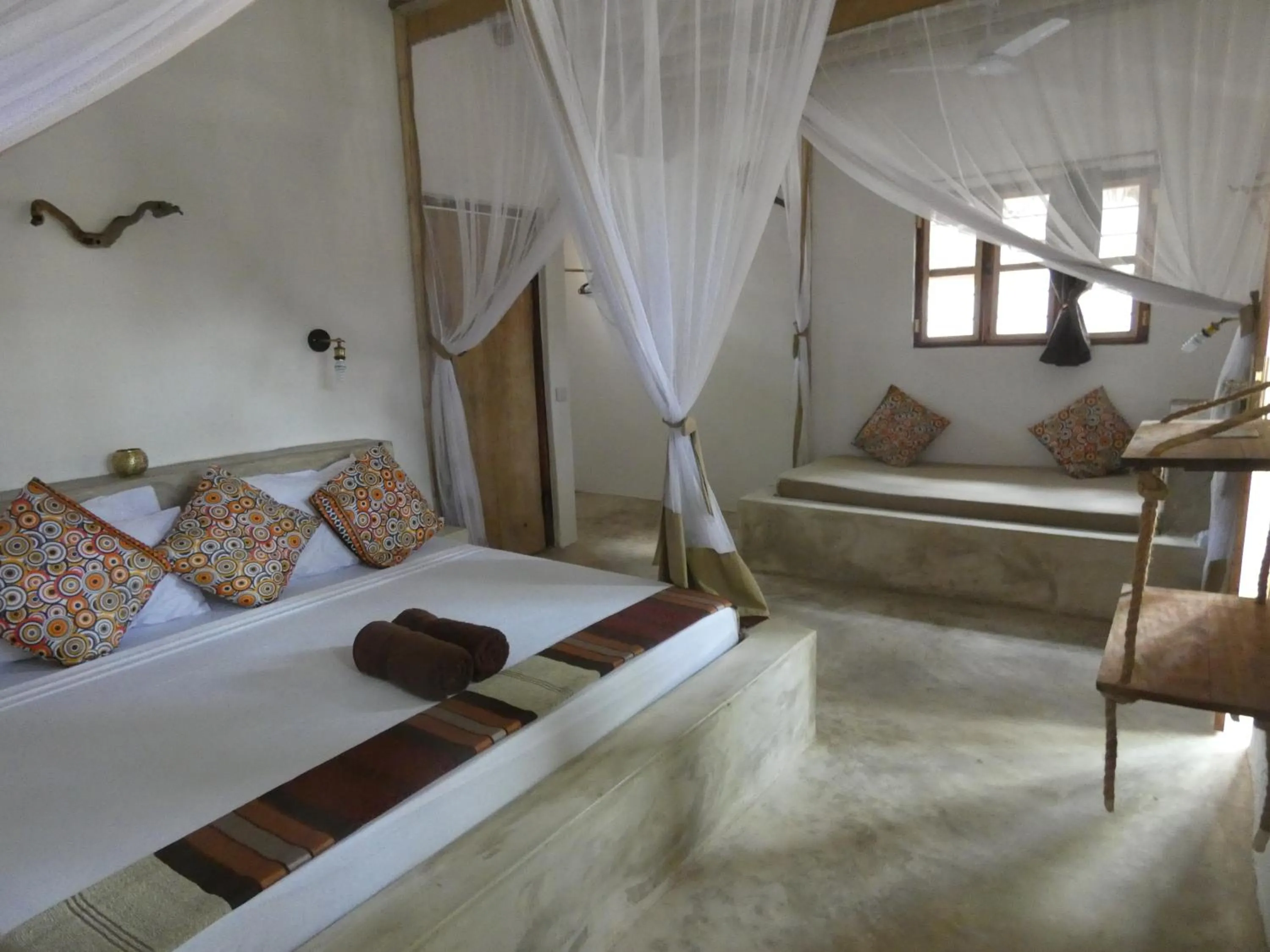 Photo of the whole room, Bed in Bahari Beach Bungalows