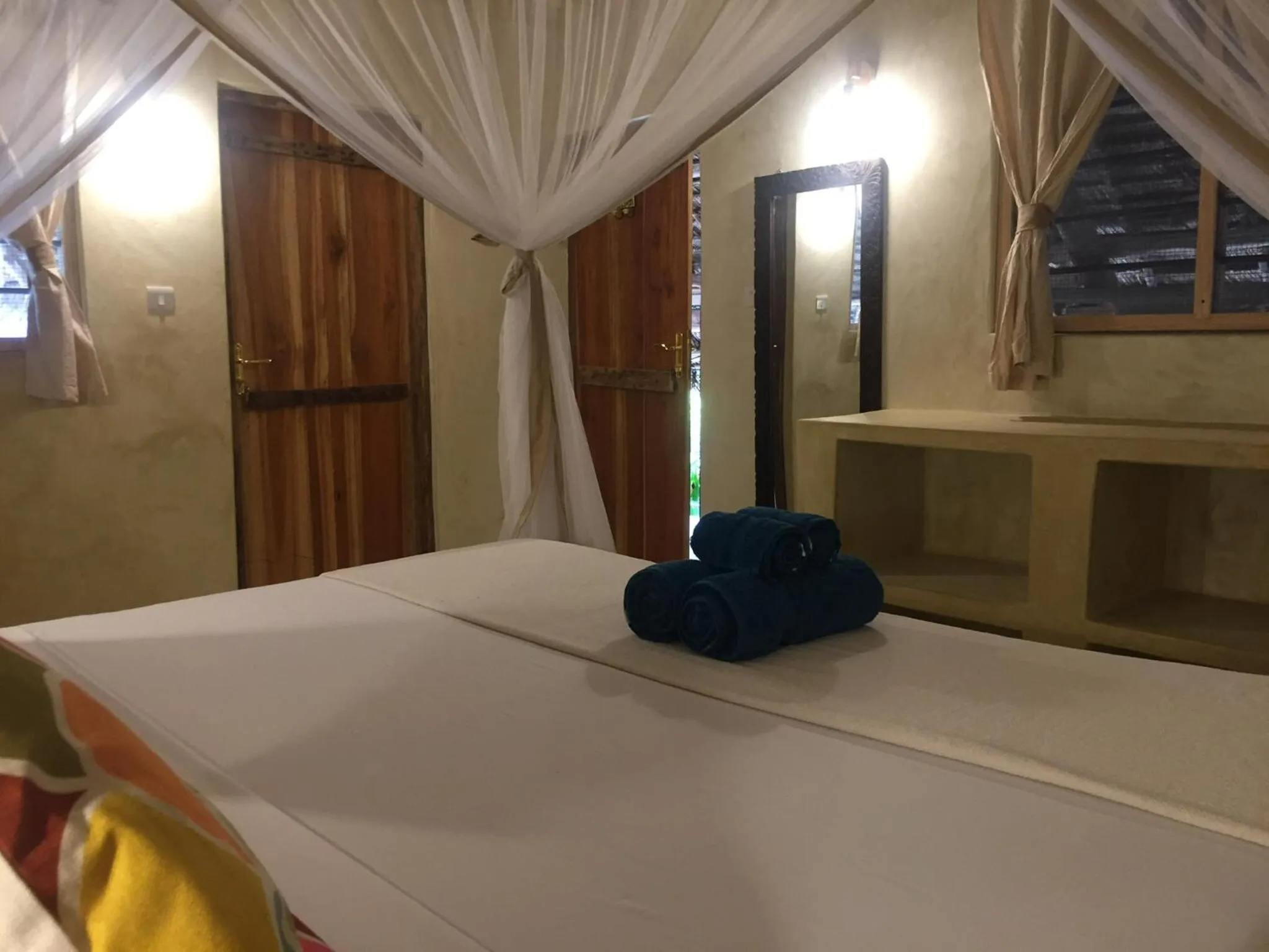 Photo of the whole room, Bed in Bahari Beach Bungalows