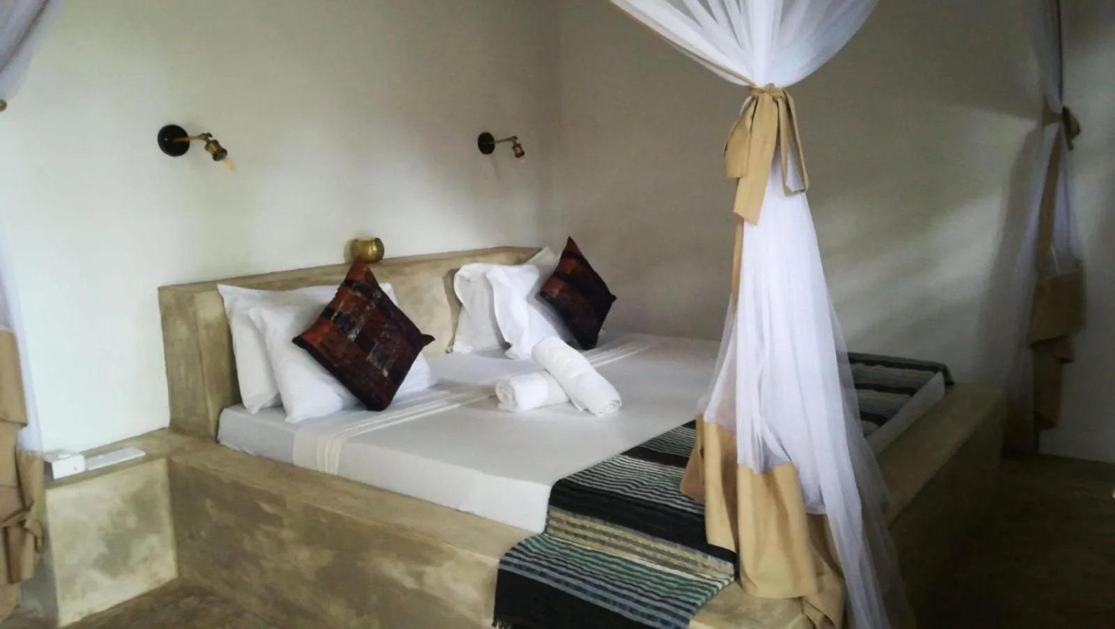 Photo of the whole room, Bed in Bahari Beach Bungalows