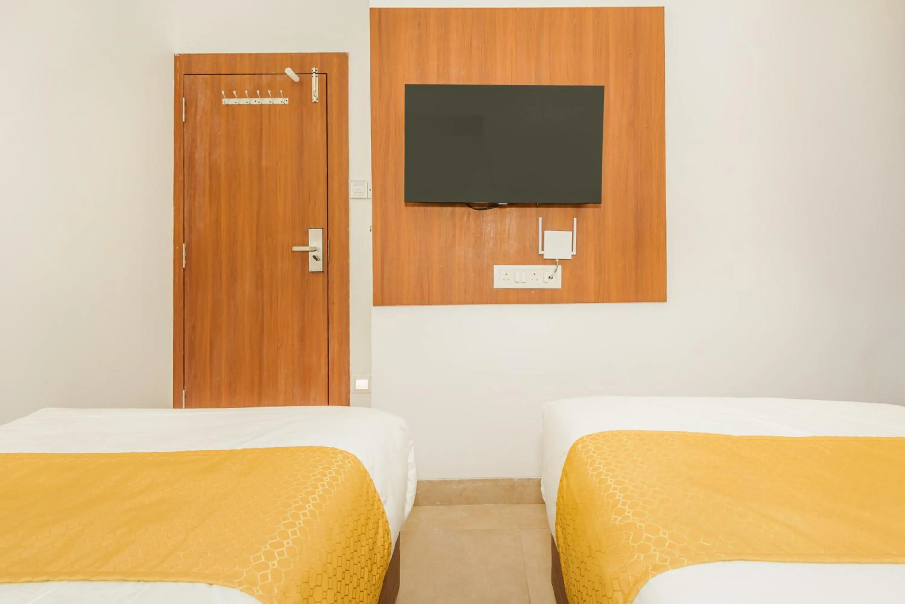 TV and multimedia, Bed in Hotel Zillion Executive Near US Consulate Bandra Kurla Complex Mumbai Near Mumbai Airport Mumbai