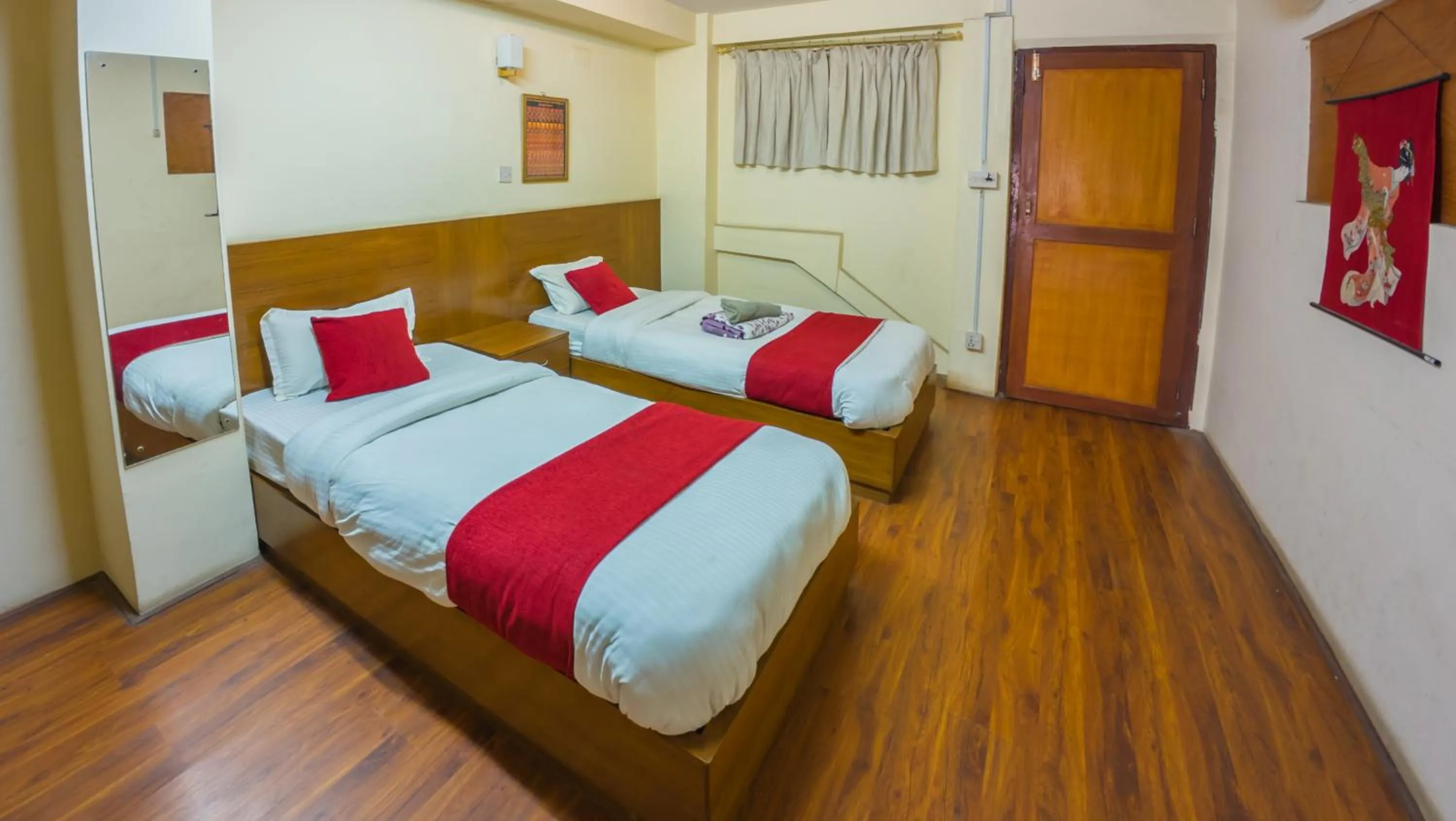 Bed in Durbar Guest House