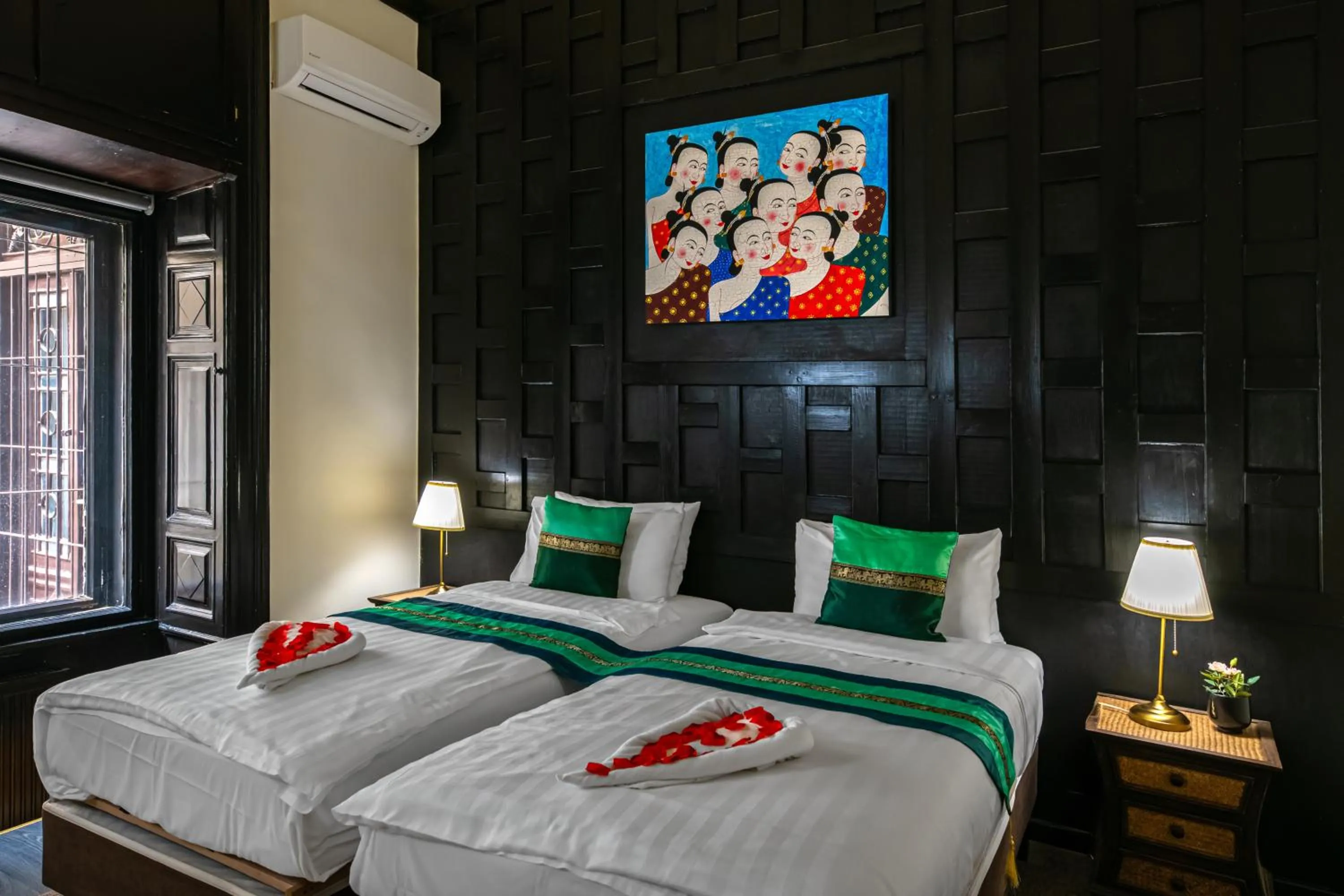 Bed in Andrassy Thai Hotel