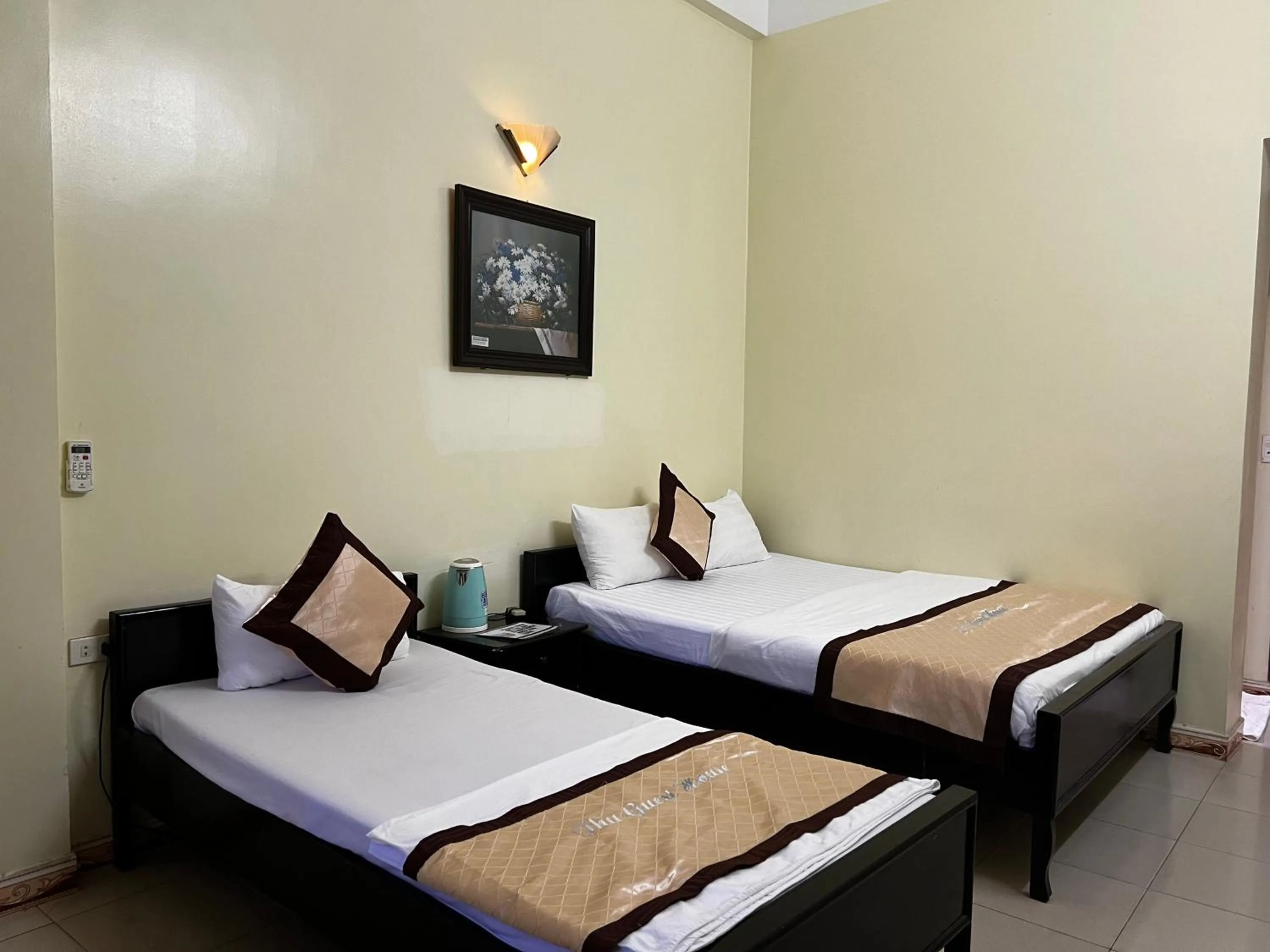 Bed in Thu Guest House