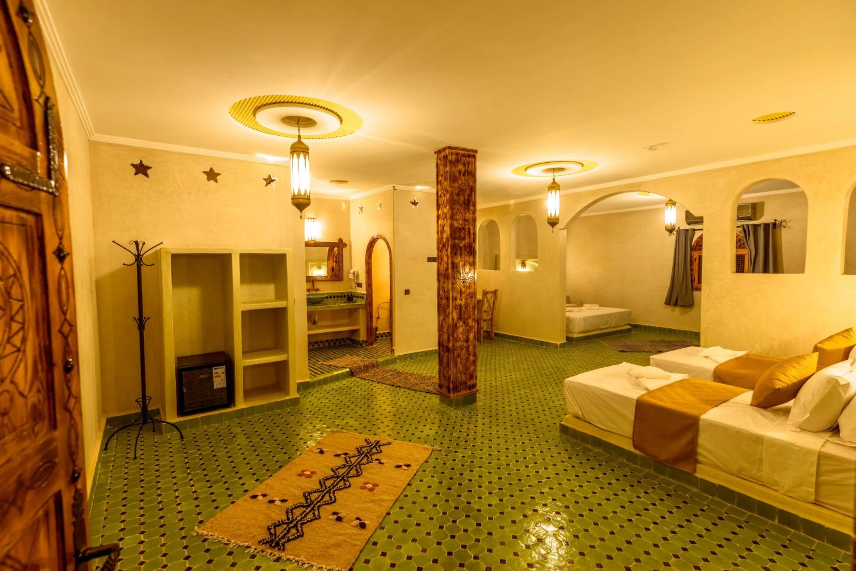 Bed in Hotel Sunset Palace