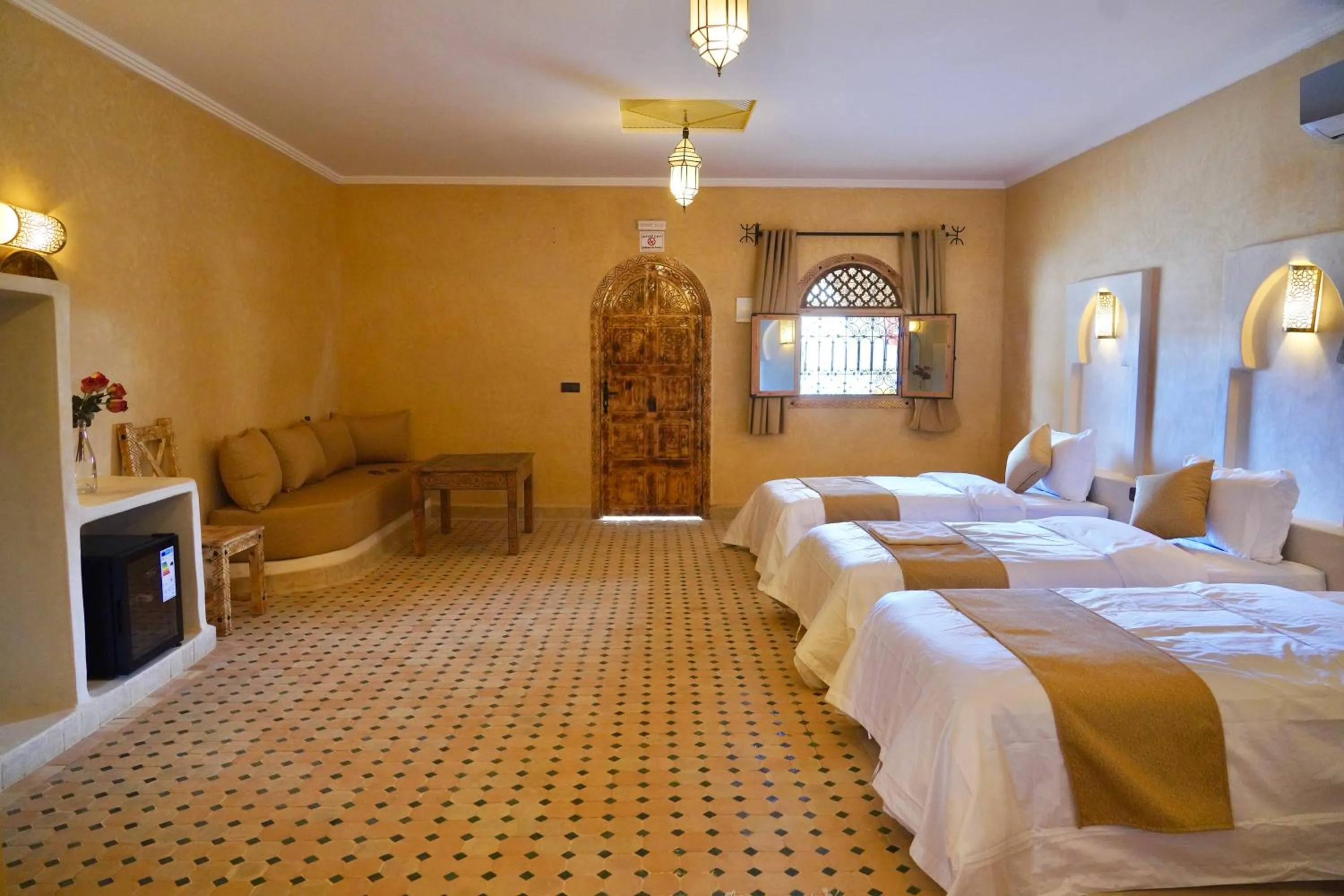 Bed in Hotel Sunset Palace