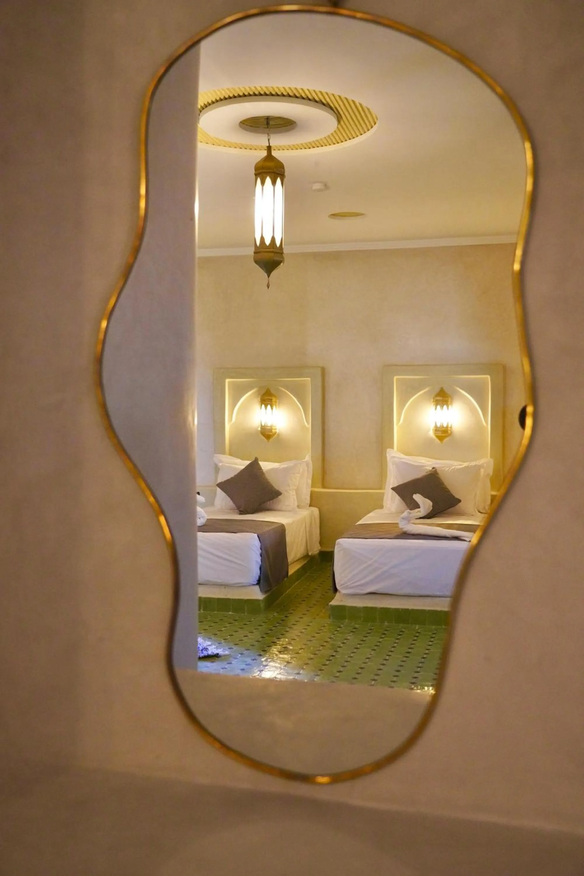 Bed in Hotel Sunset Palace