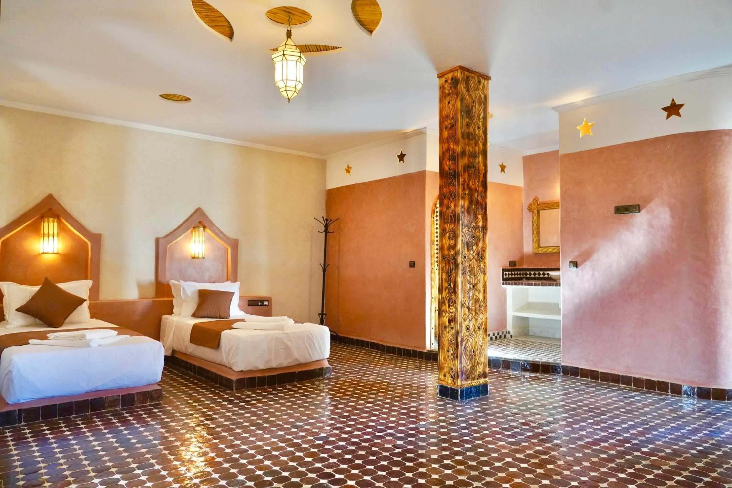 Bed in Hotel Sunset Palace