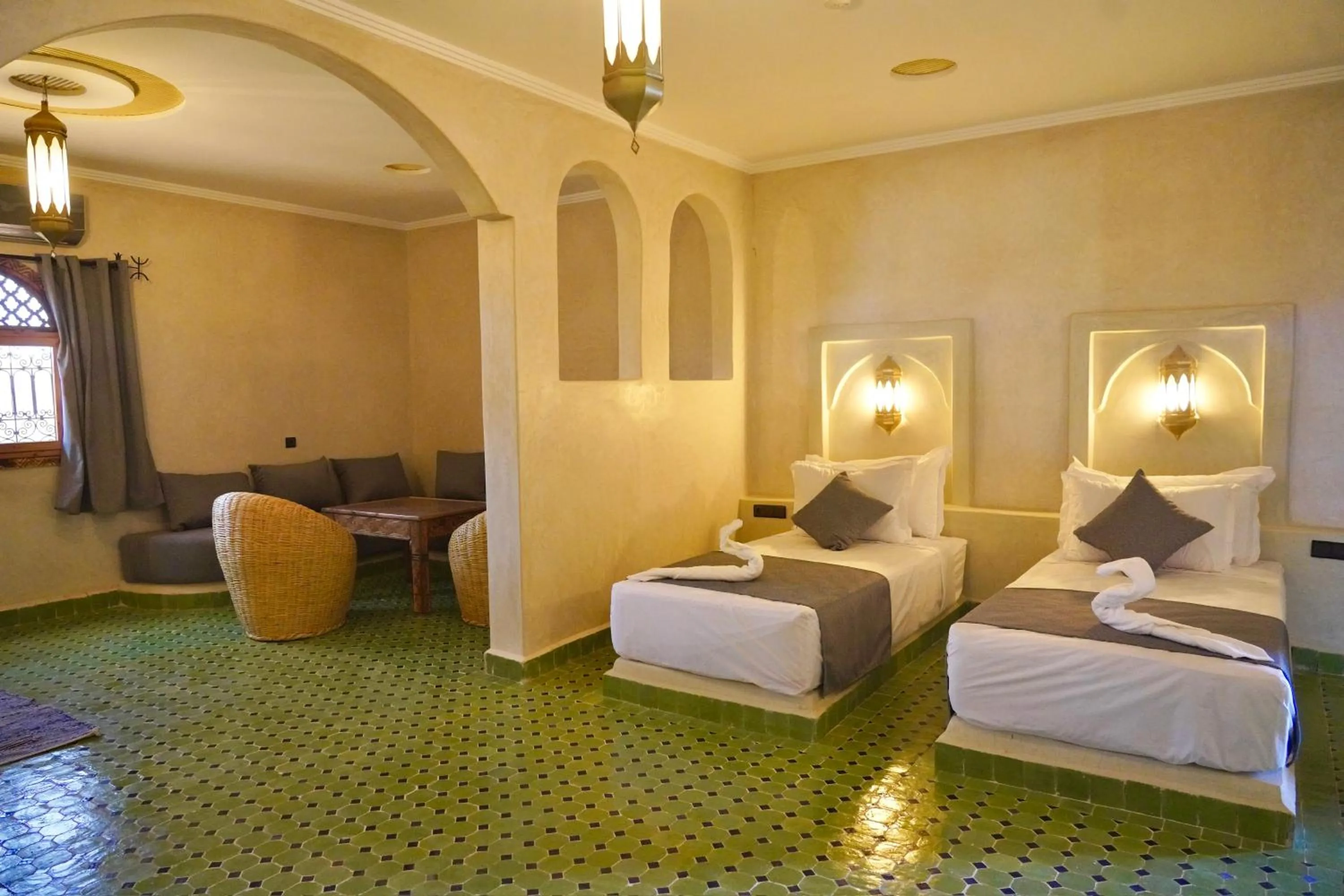 Bed in Hotel Sunset Palace