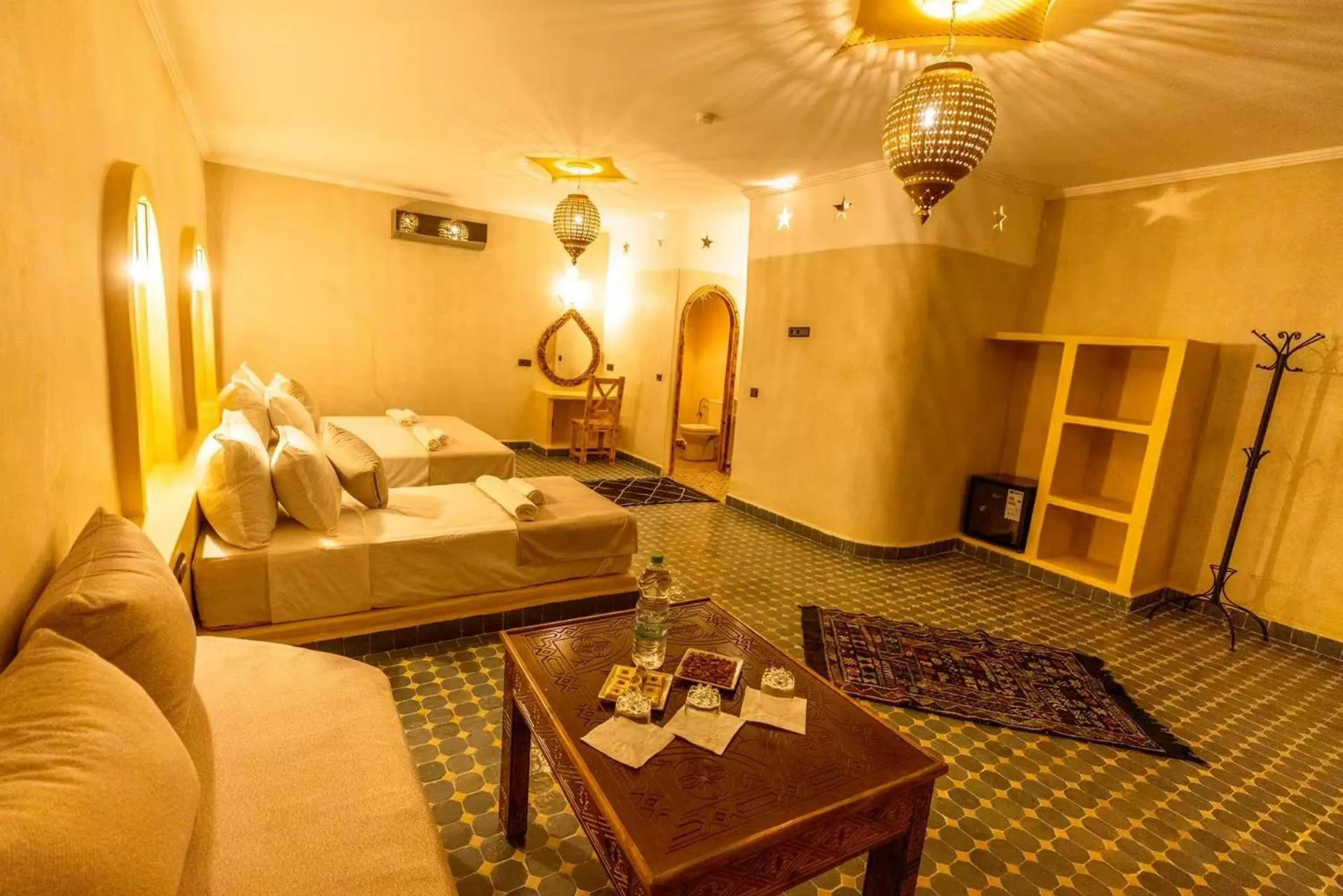 Bed in Hotel Sunset Palace